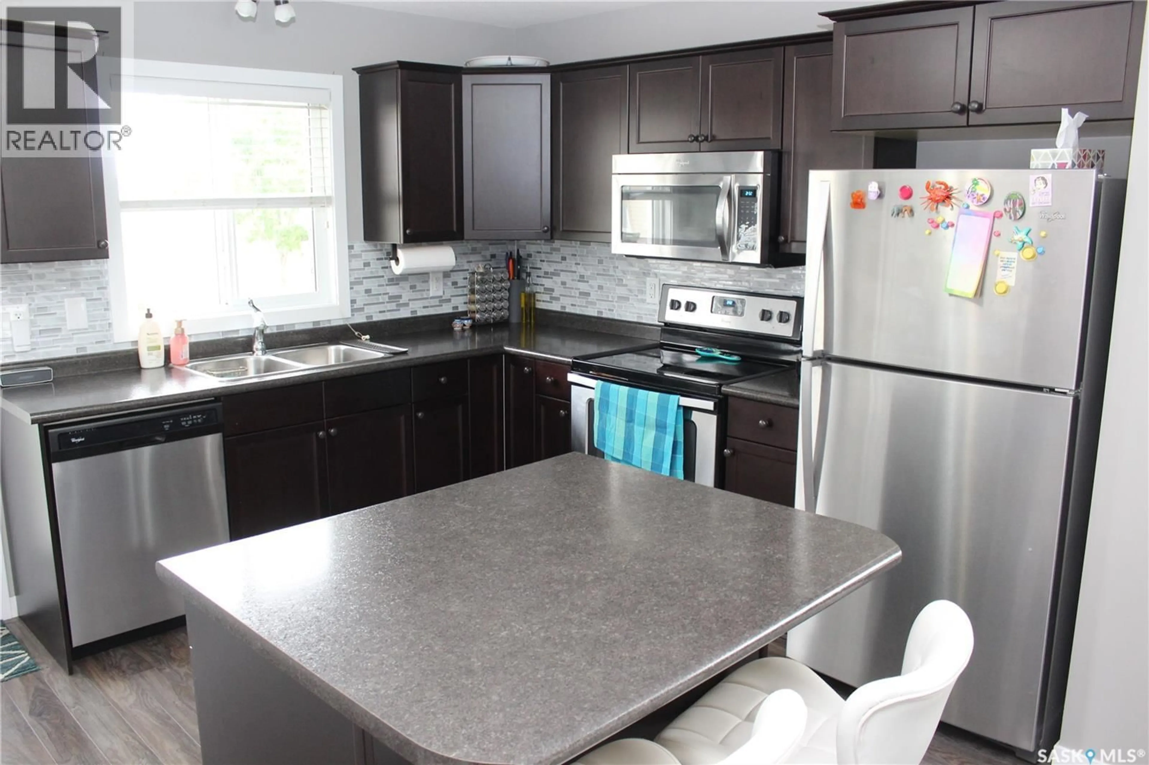 Open concept kitchen, ceramic/tile floor for 4850 - 56 HARBOUR LANDING DRIVE, Regina Saskatchewan S4W0K9