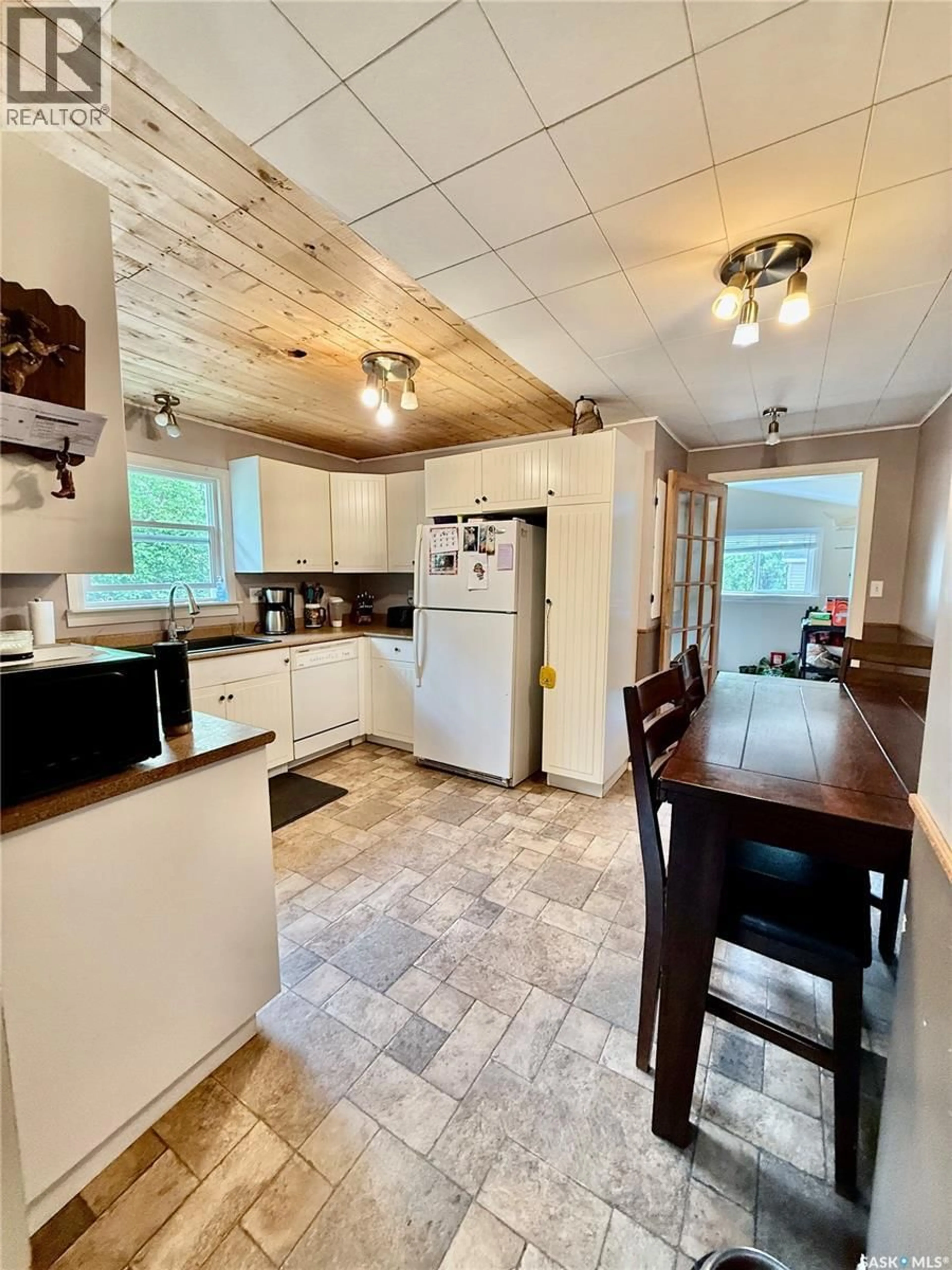 Open concept kitchen, ceramic/tile floor for 103 2ND AVENUE, Paynton Saskatchewan S0M2J0