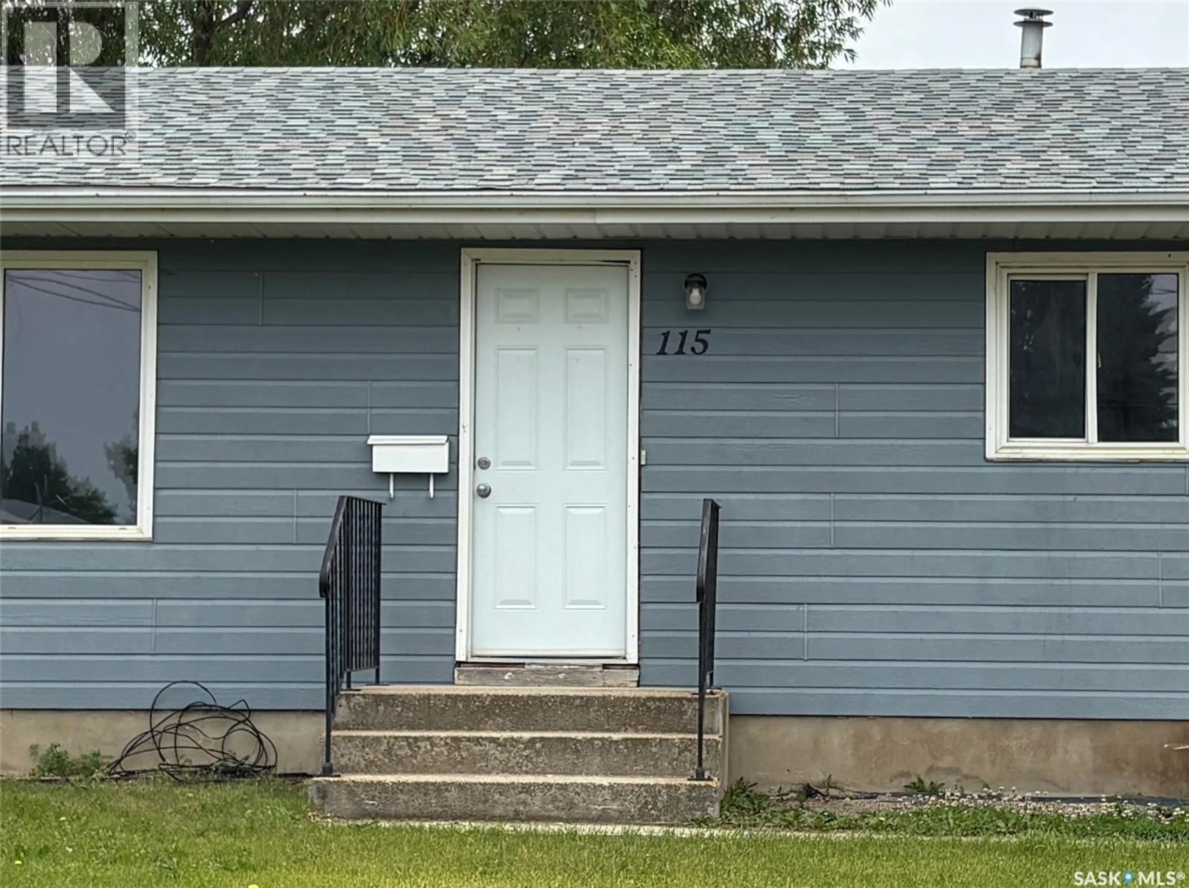 Home with vinyl exterior material, street for 111-115 MILL AVENUE, Big River Saskatchewan S0J0E0