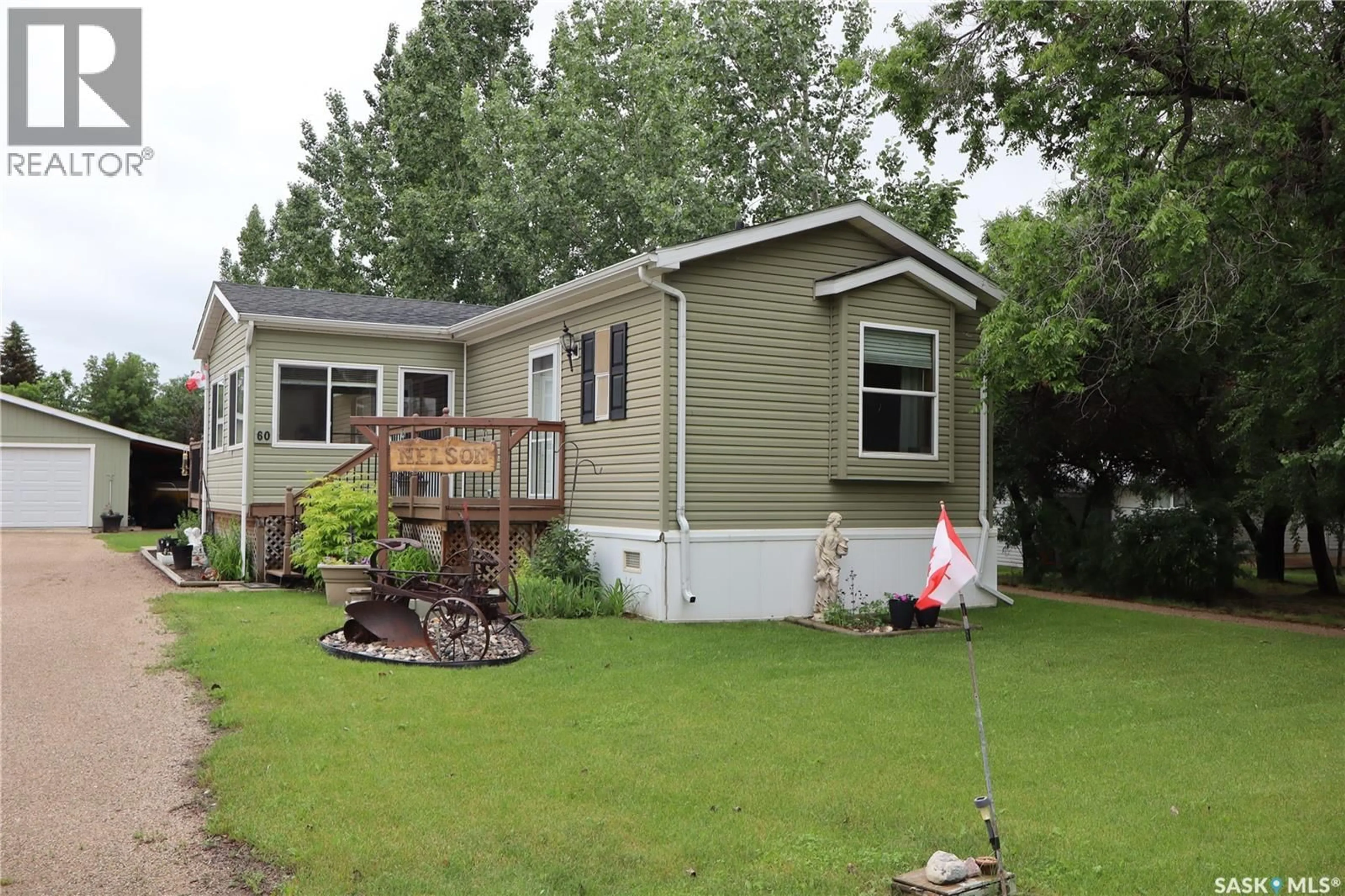 Home with vinyl exterior material, street for 60 PELICAN STREET, Wood River Rm No. 74 Saskatchewan S0H2K0