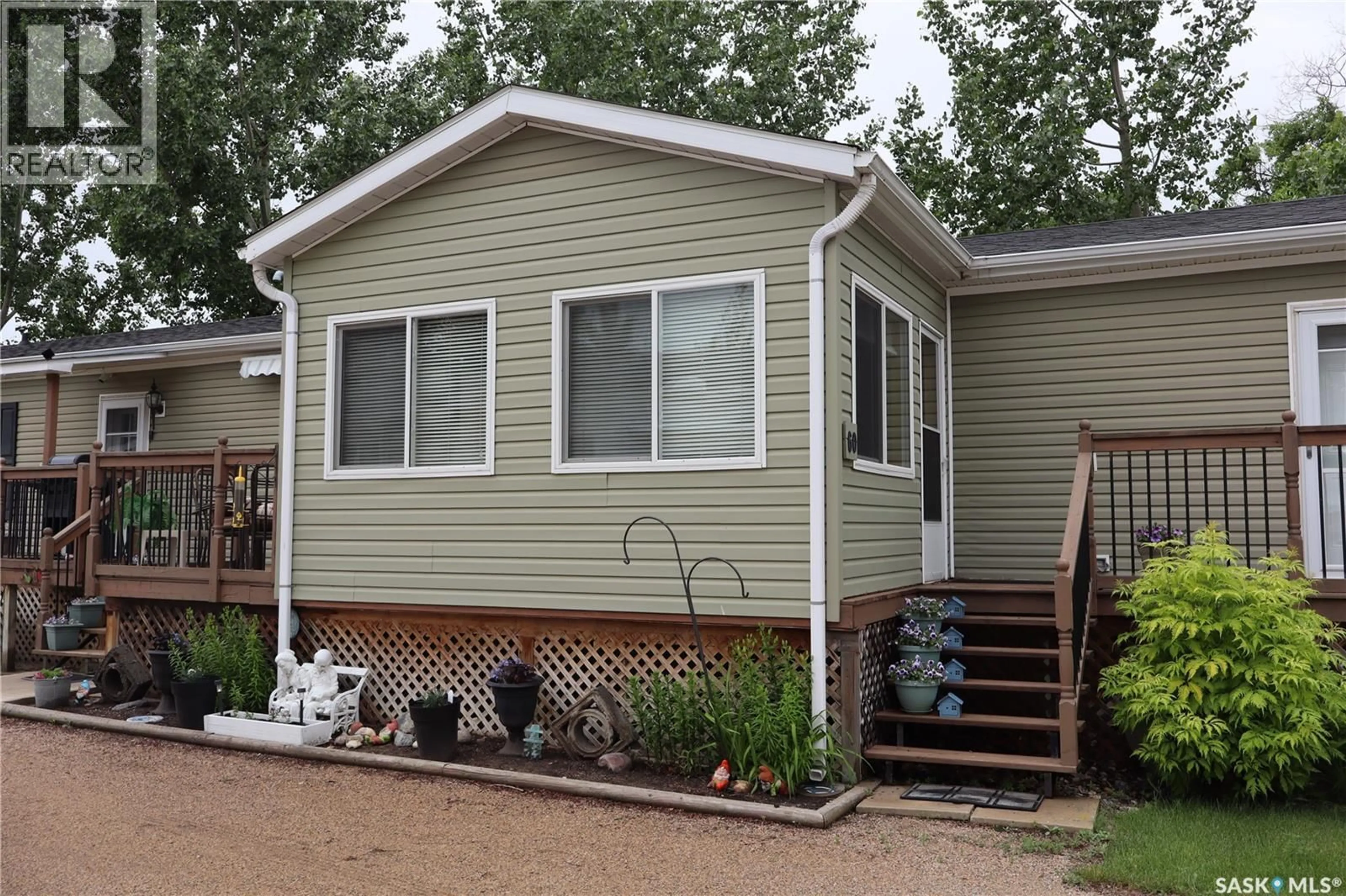 Home with vinyl exterior material, street for 60 PELICAN STREET, Wood River Rm No. 74 Saskatchewan S0H2K0