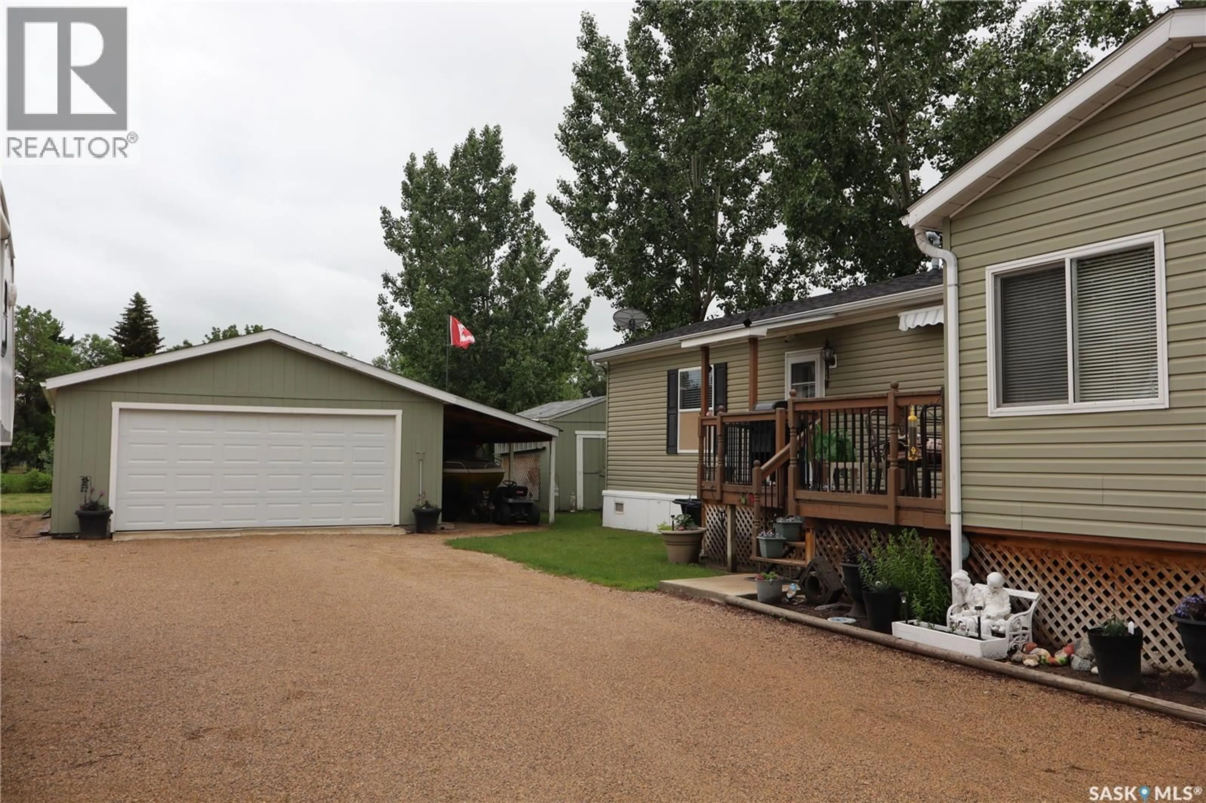 Home with vinyl exterior material, street for 60 PELICAN STREET, Wood River Rm No. 74 Saskatchewan S0H2K0
