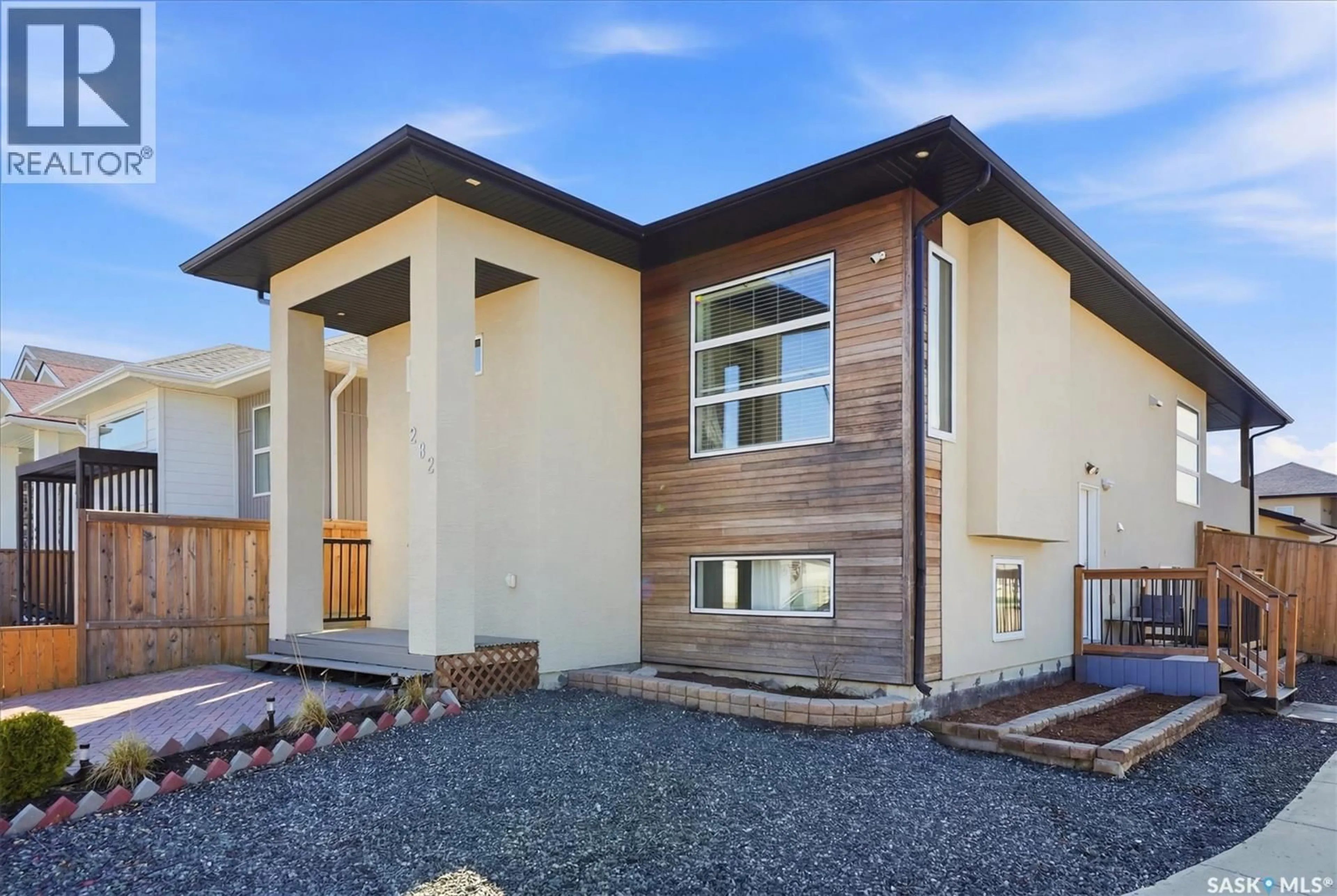 Home with vinyl exterior material, street for 202 BENTLEY COURT, Saskatoon Saskatchewan S7L6L4