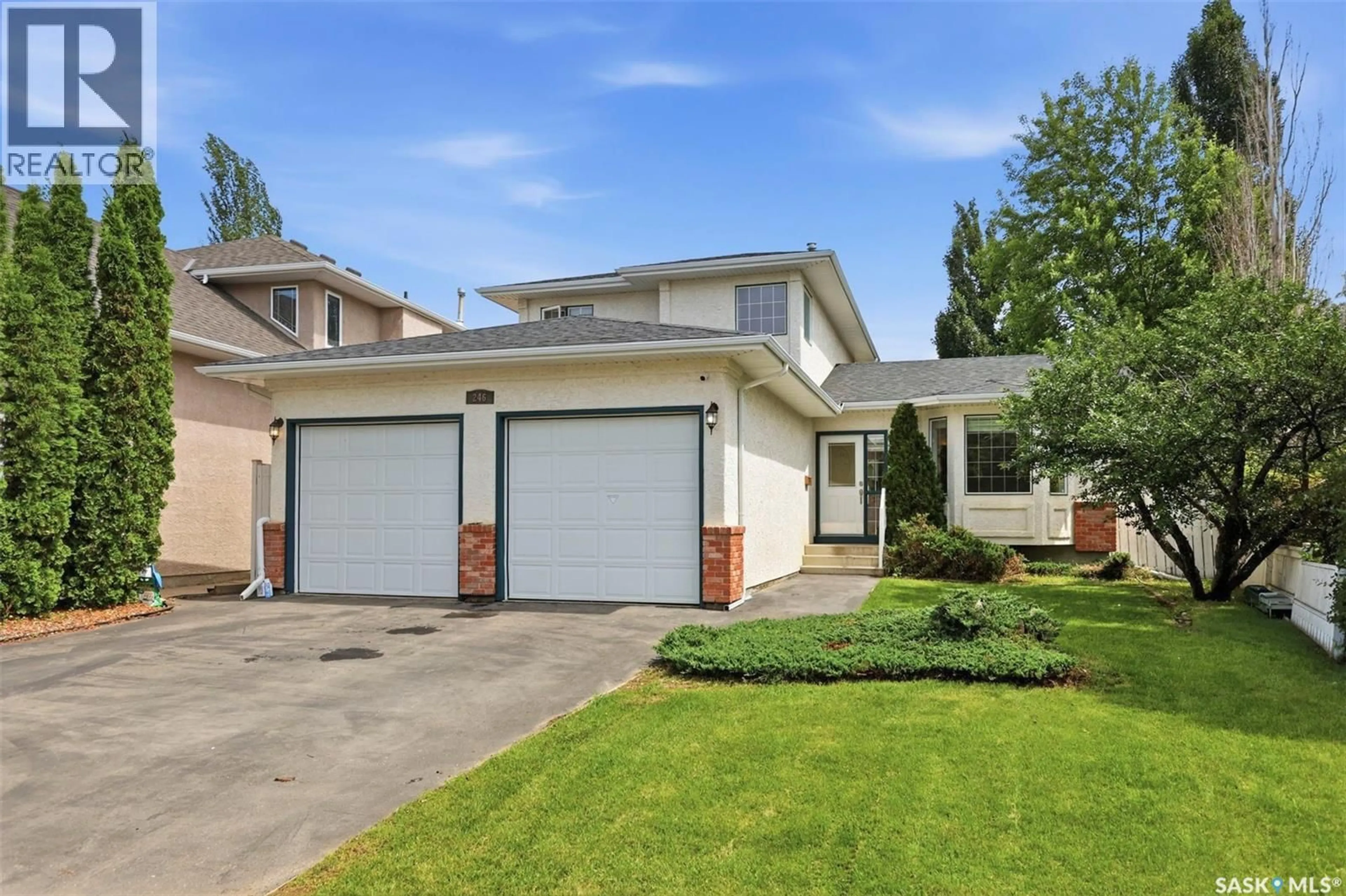 Home with vinyl exterior material, street for 246 BROOKMORE LANE, Saskatoon Saskatchewan S7V1C2
