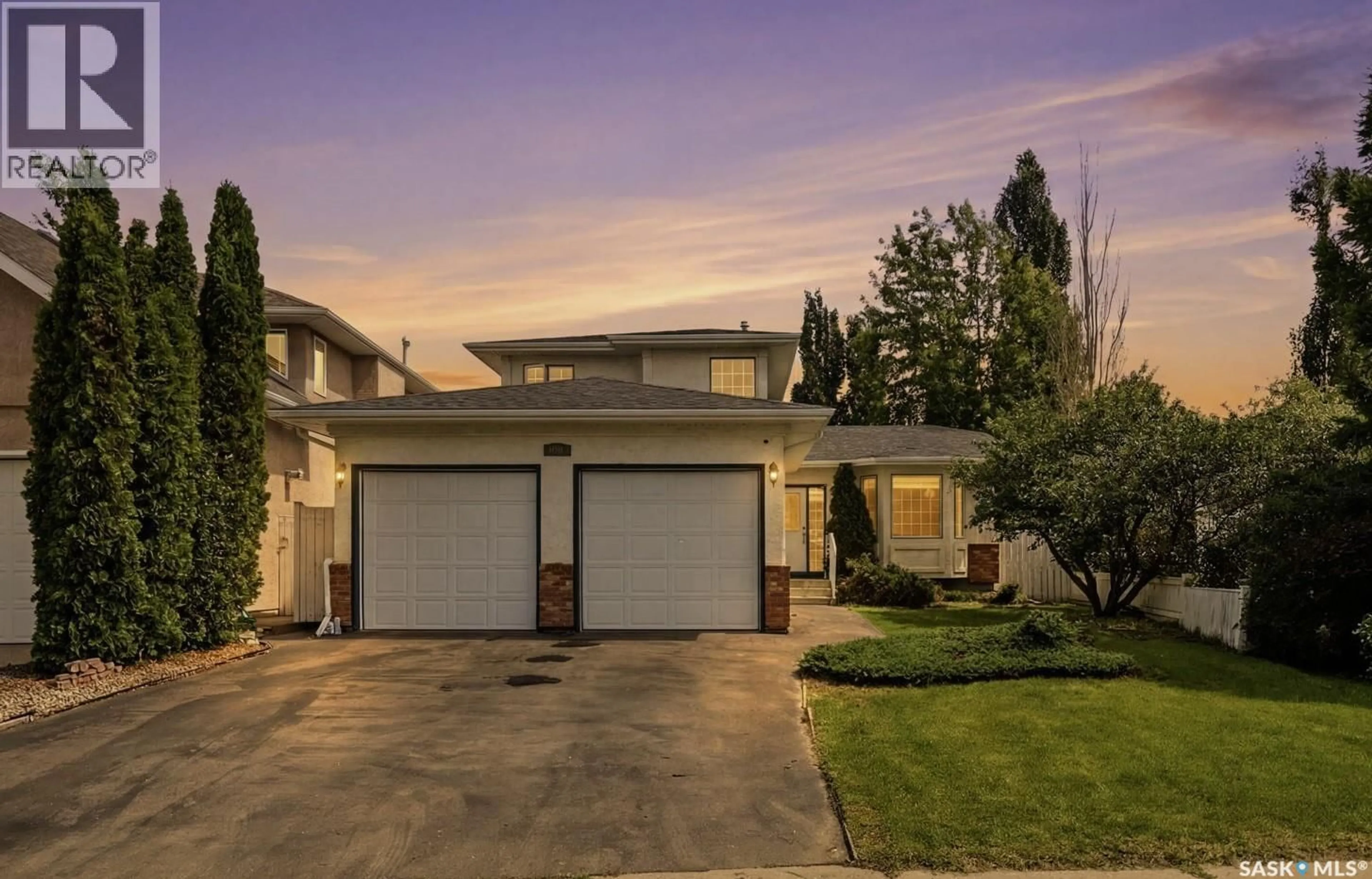 Home with vinyl exterior material, street for 246 BROOKMORE LANE, Saskatoon Saskatchewan S7V1C2
