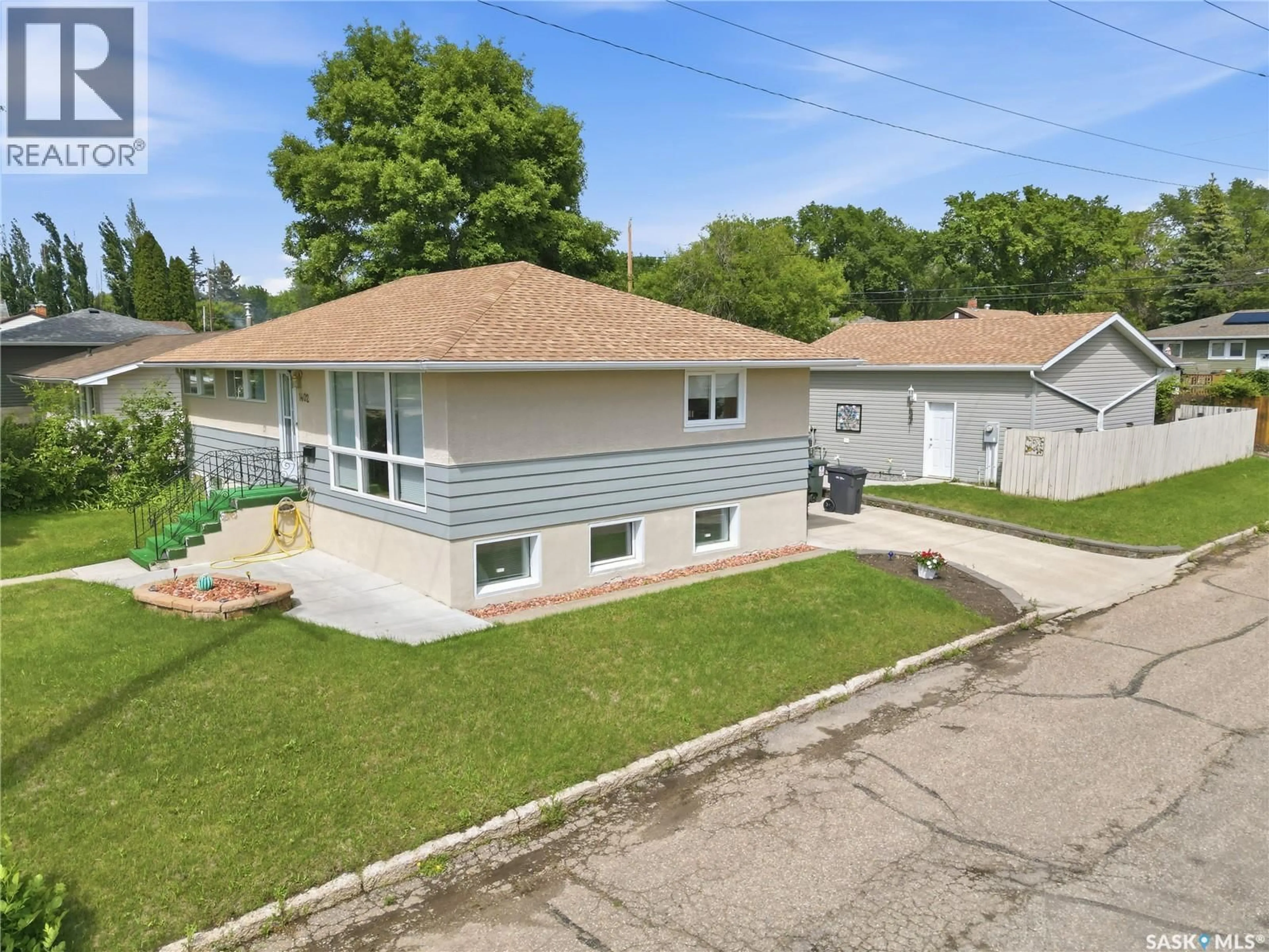 A pic from outside/outdoor area/front of a property/back of a property/a pic from drone, street for 1402 93RD STREET, North Battleford Saskatchewan S9A0C1