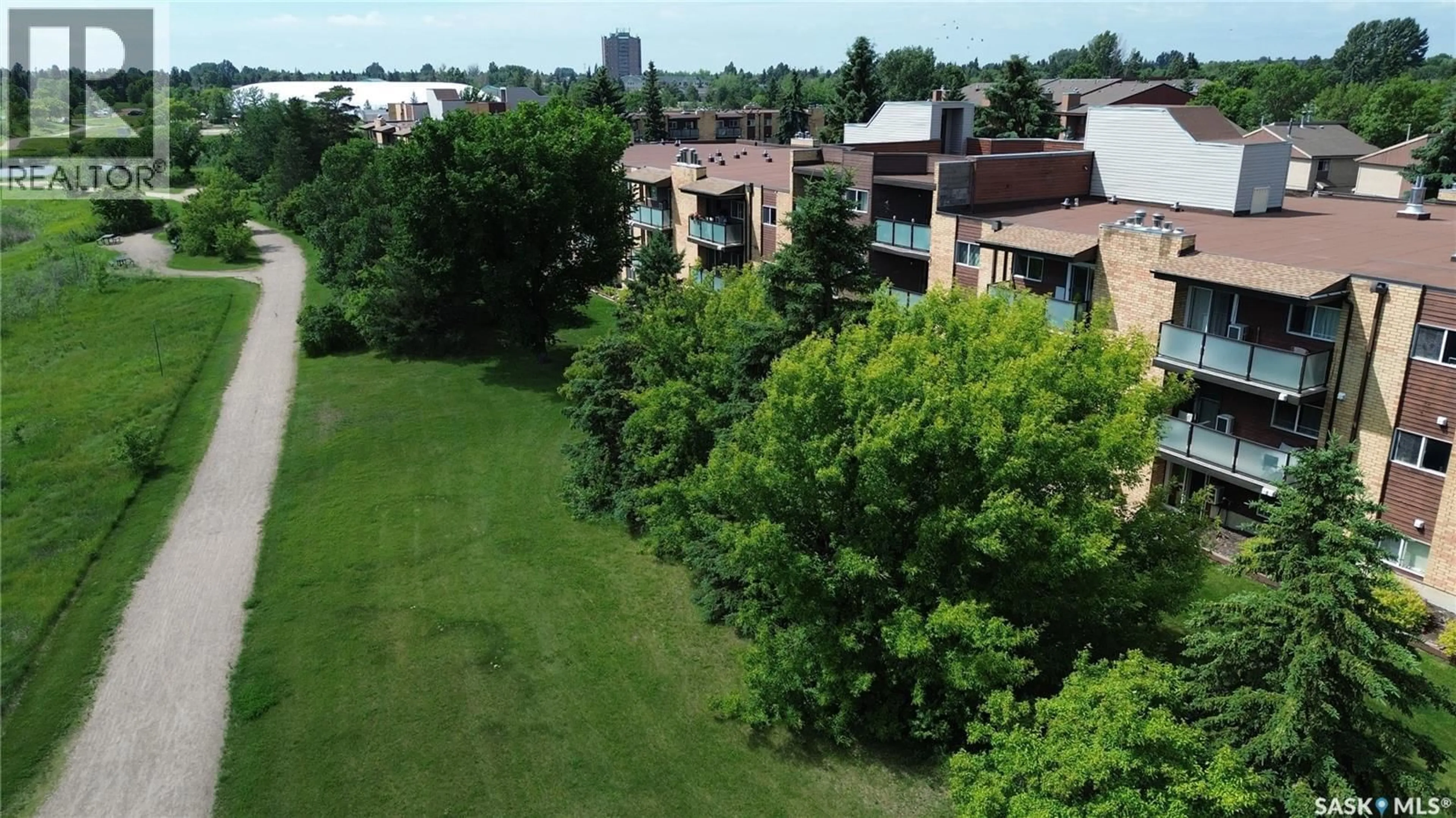 A pic from outside/outdoor area/front of a property/back of a property/a pic from drone, city buildings view from balcony for 104 411 TAIT COURT, Saskatoon Saskatchewan S7H5L3