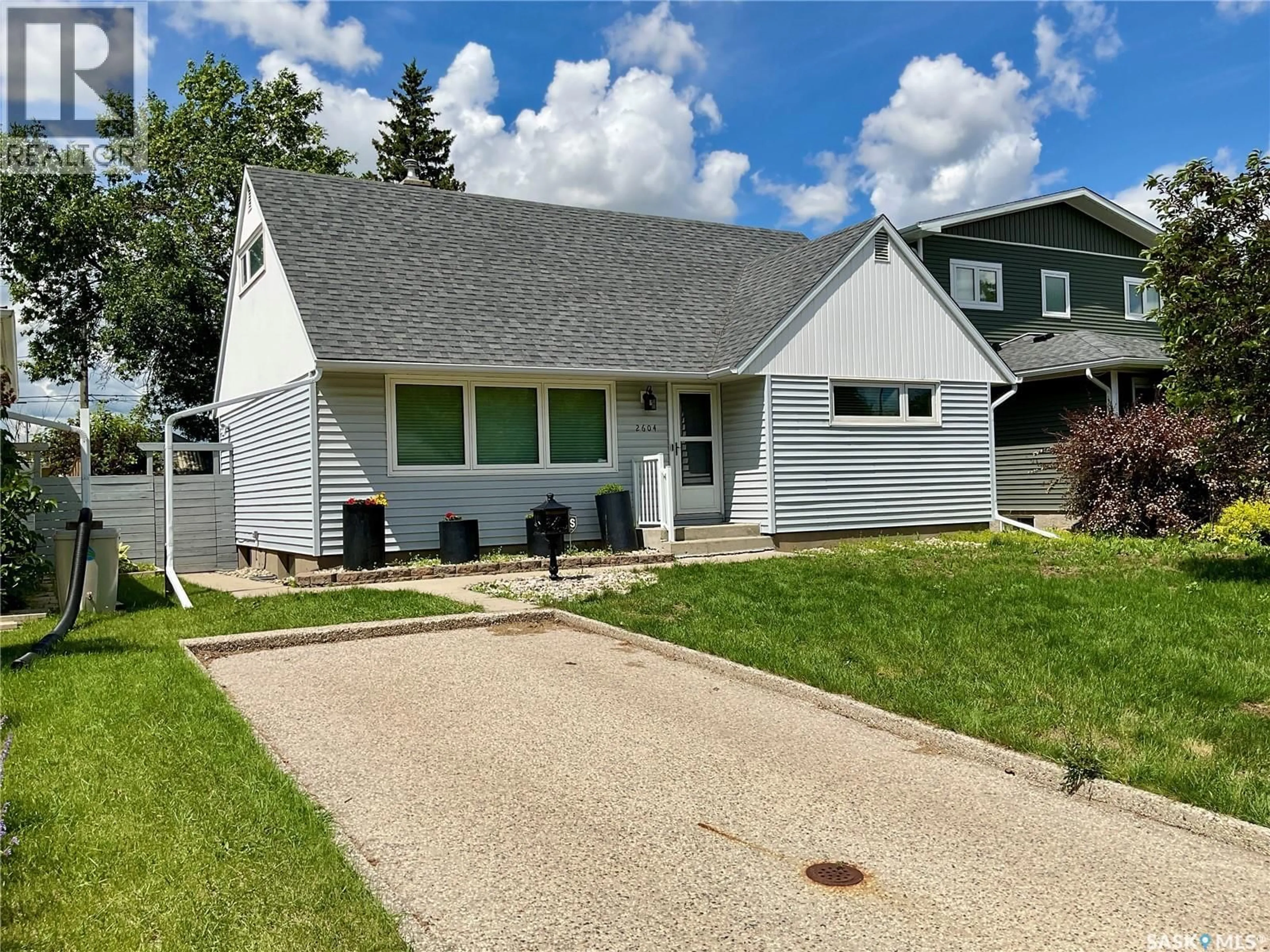 Home with vinyl exterior material, street for 2604 EDWARD STREET, Regina Saskatchewan S4S0M8