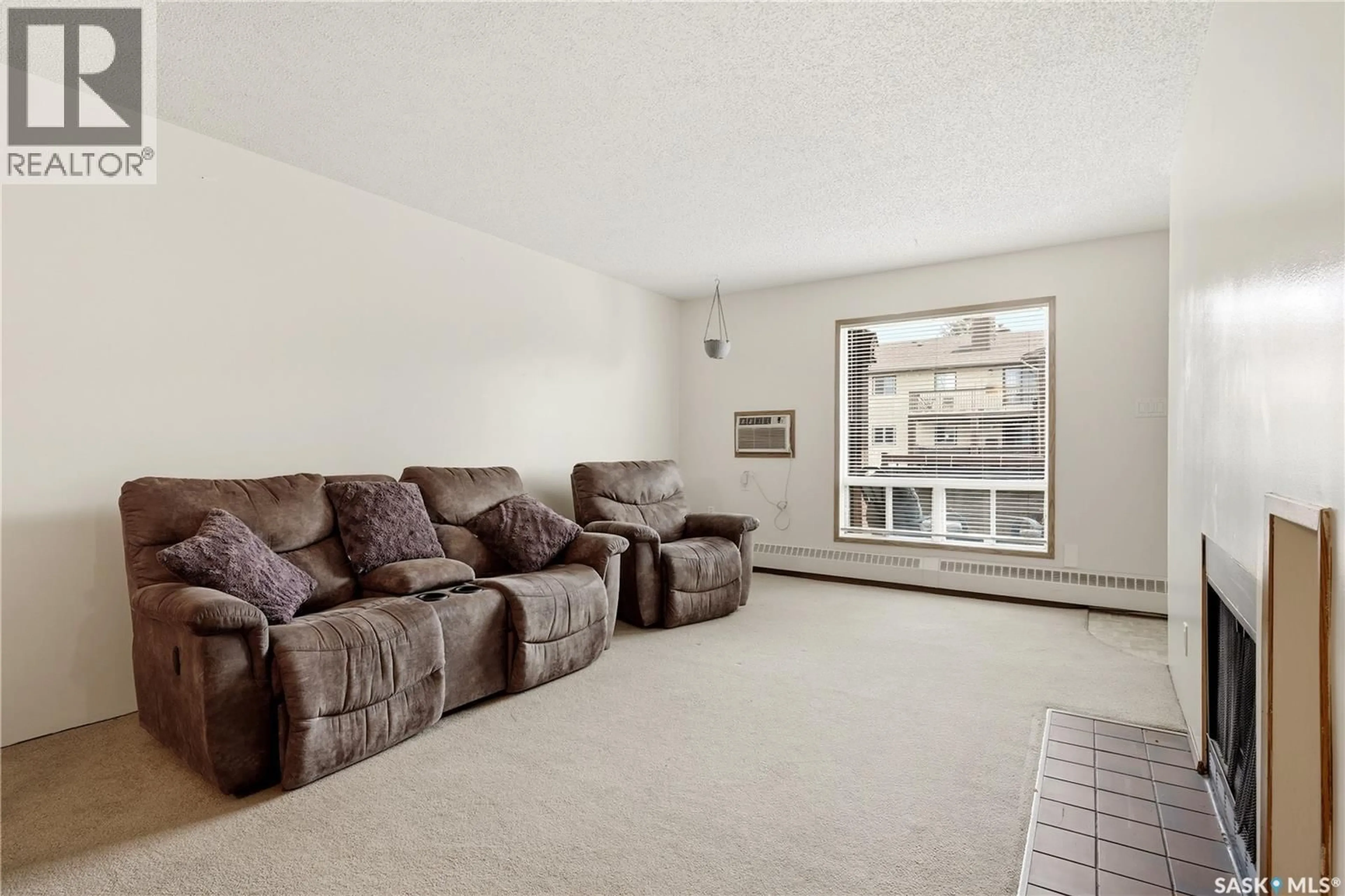 Living room with furniture, unknown for 15 - 203 ALPORT CRESCENT, Regina Saskatchewan S4R8C6