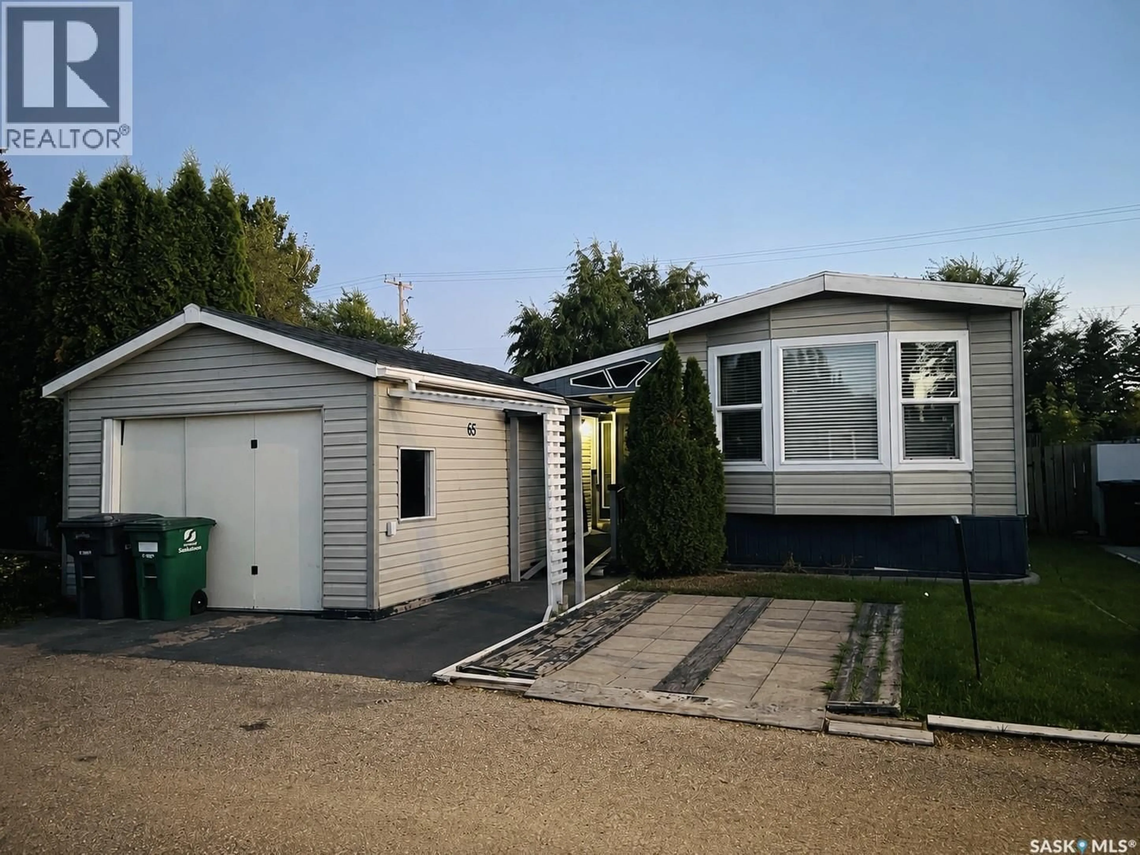 Home with vinyl exterior material, street for 1035 - 65 BOYCHUK DRIVE, Saskatoon Saskatchewan S7H5B2