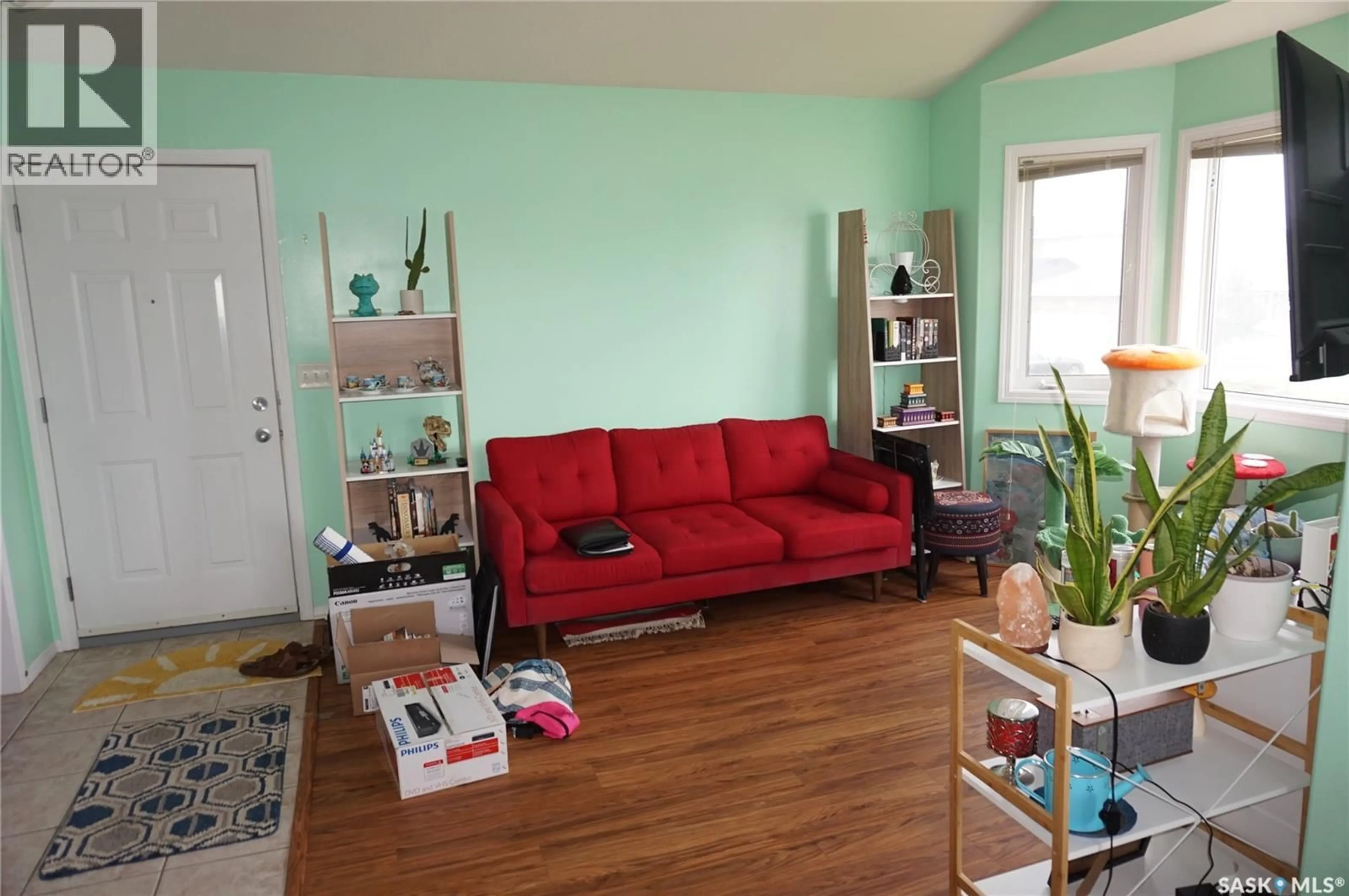 Living room with furniture, unknown for 4080 BUCKINGHAM DRIVE, Regina Saskatchewan S4V3E9