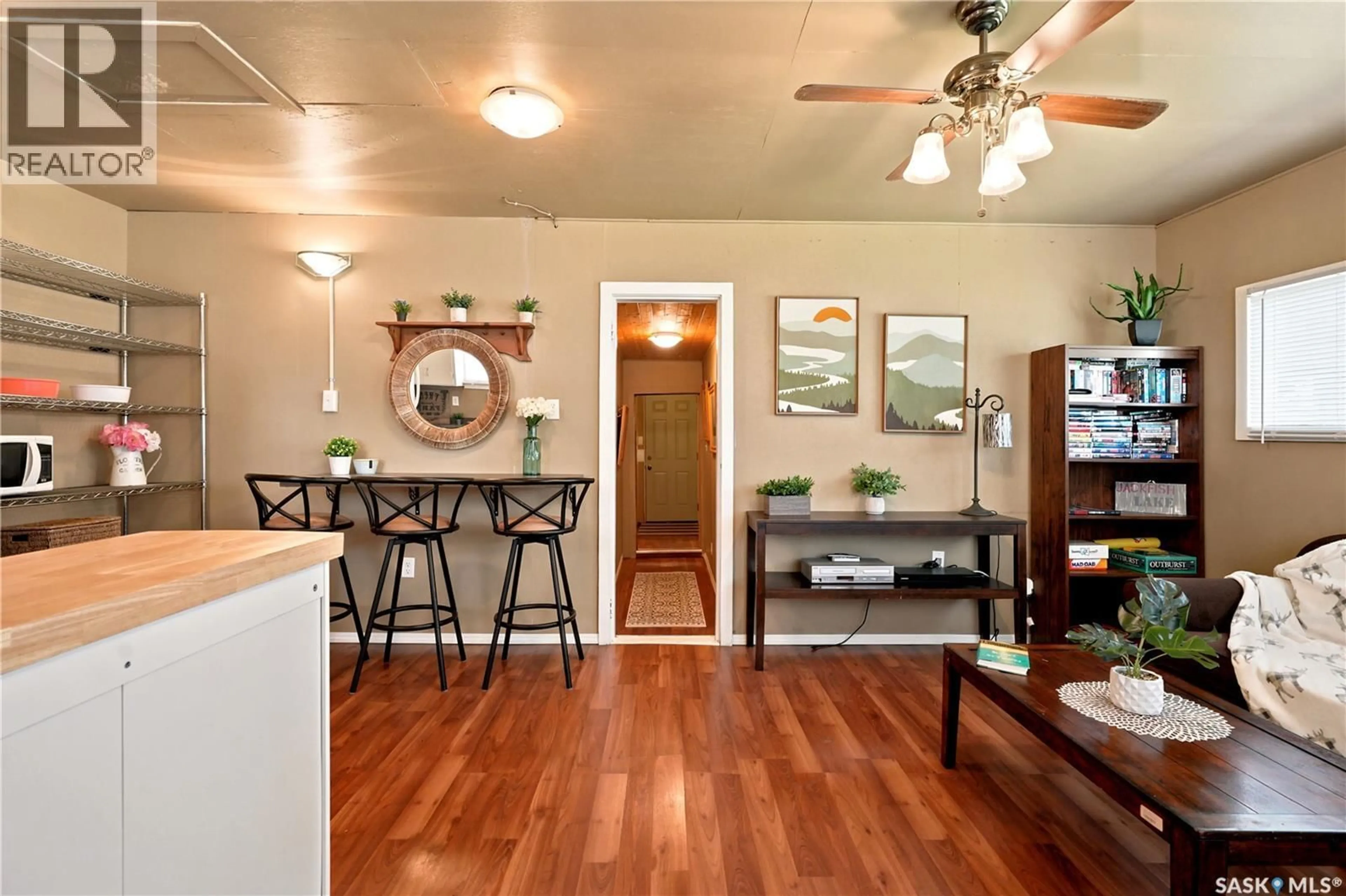Open concept kitchen, wood/laminate floor for 982 TERRY STREET, Cochin Saskatchewan S0L0M0