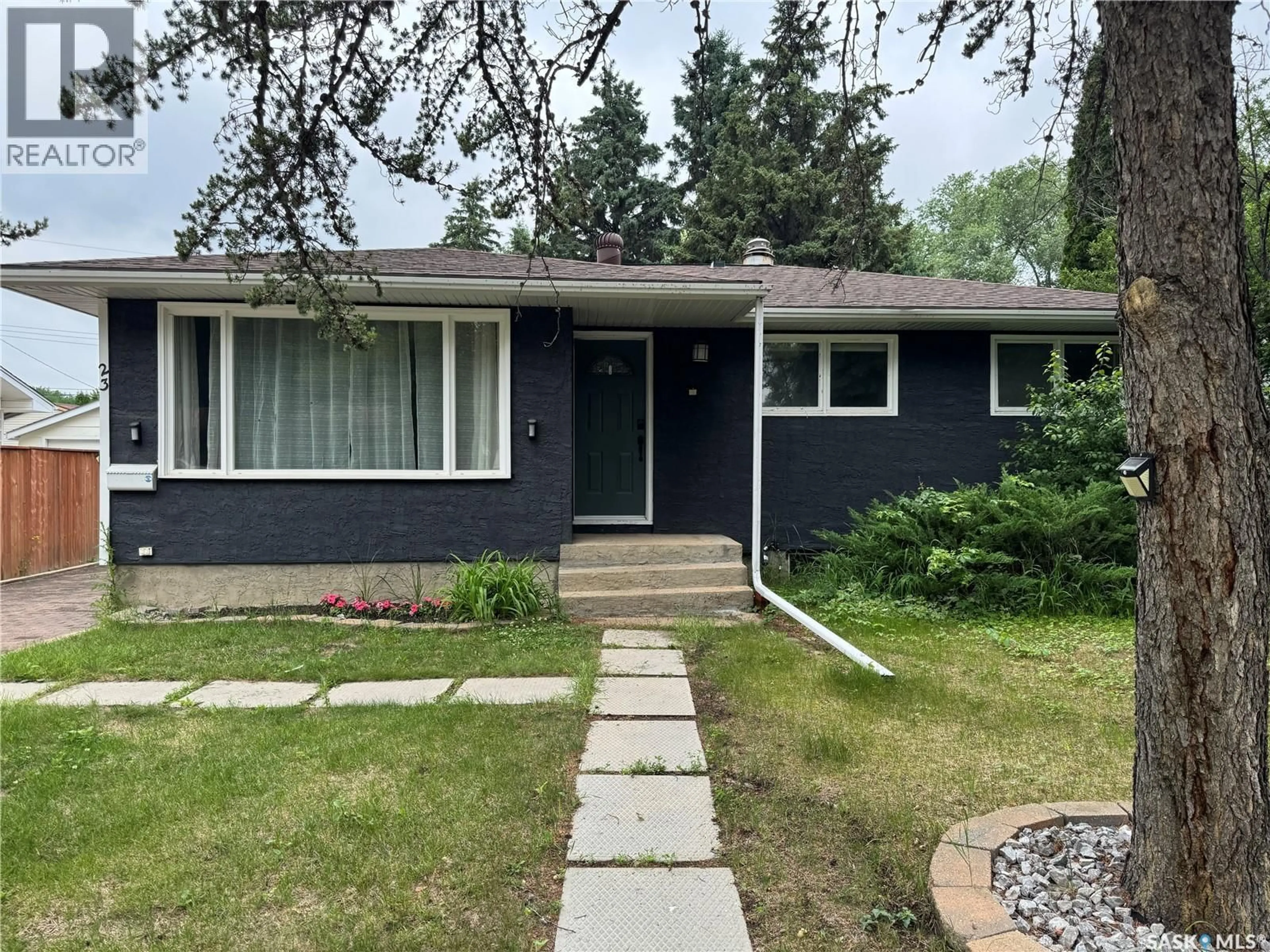 Home with vinyl exterior material, street for 23 DUNNING CRESCENT, Saskatoon Saskatchewan S7J2S6