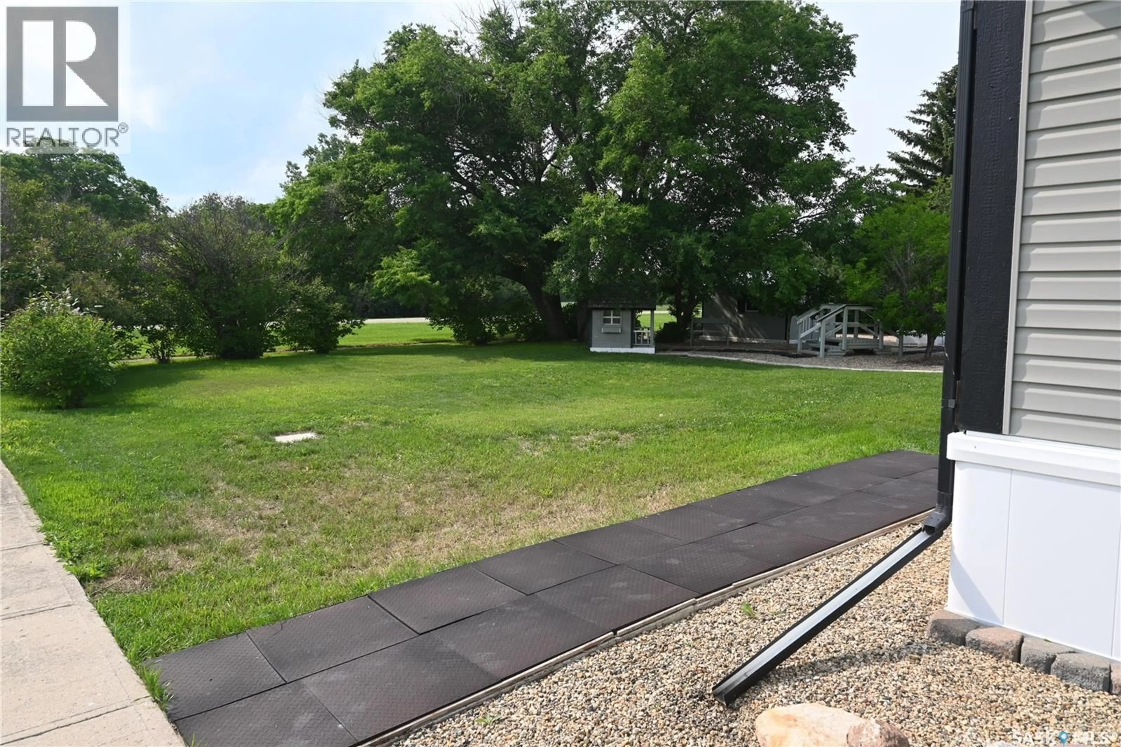 A pic from outside/outdoor area/front of a property/back of a property/a pic from drone, street for 400 MAIN STREET, Lang Saskatchewan S0G2W0