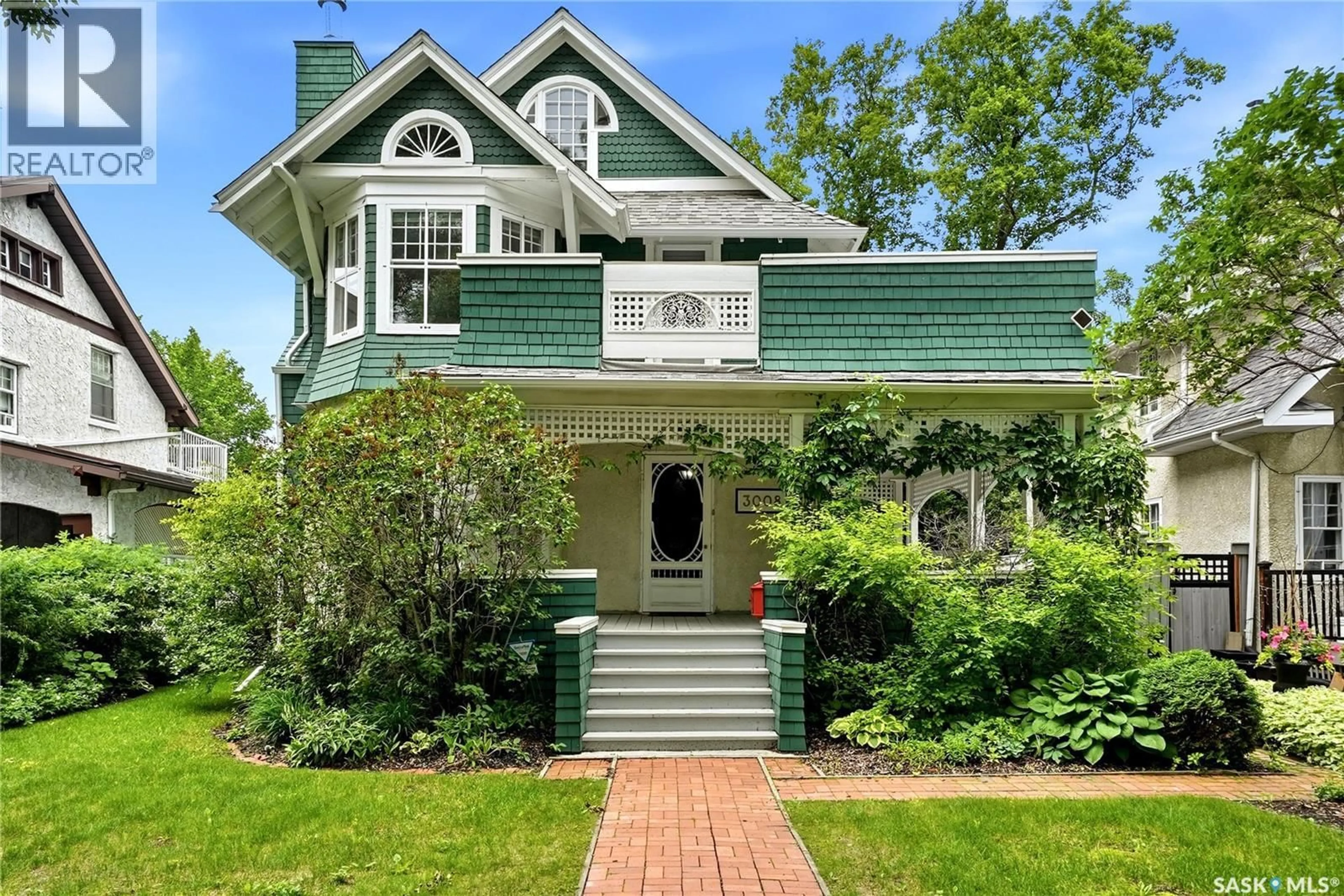 Home with brick exterior material, street for 3008 VICTORIA AVENUE, Regina Saskatchewan S4T1K9