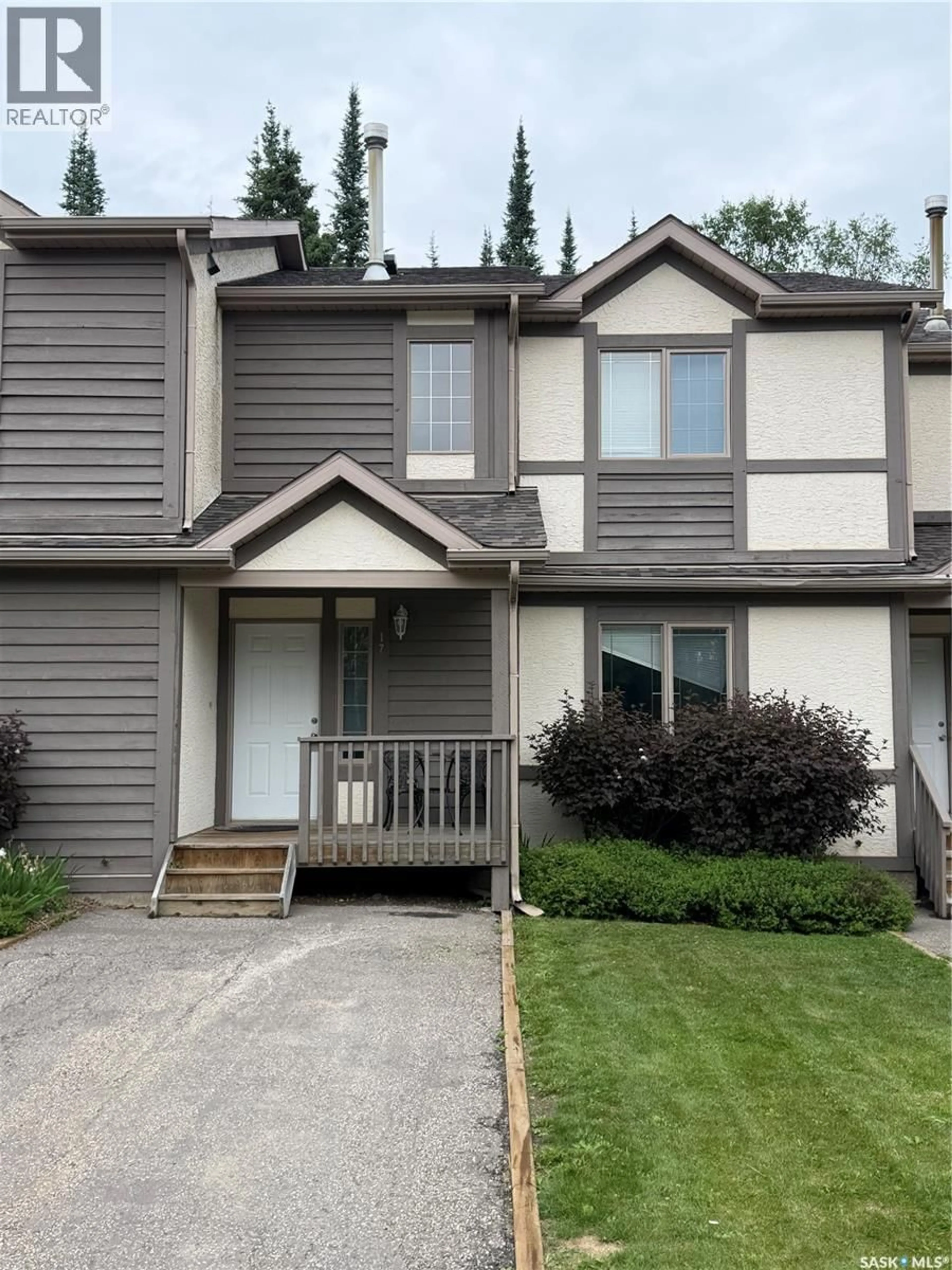 Home with vinyl exterior material, street for 17 FAIRWAY DRIVE, Elk Ridge Saskatchewan S0J0N0