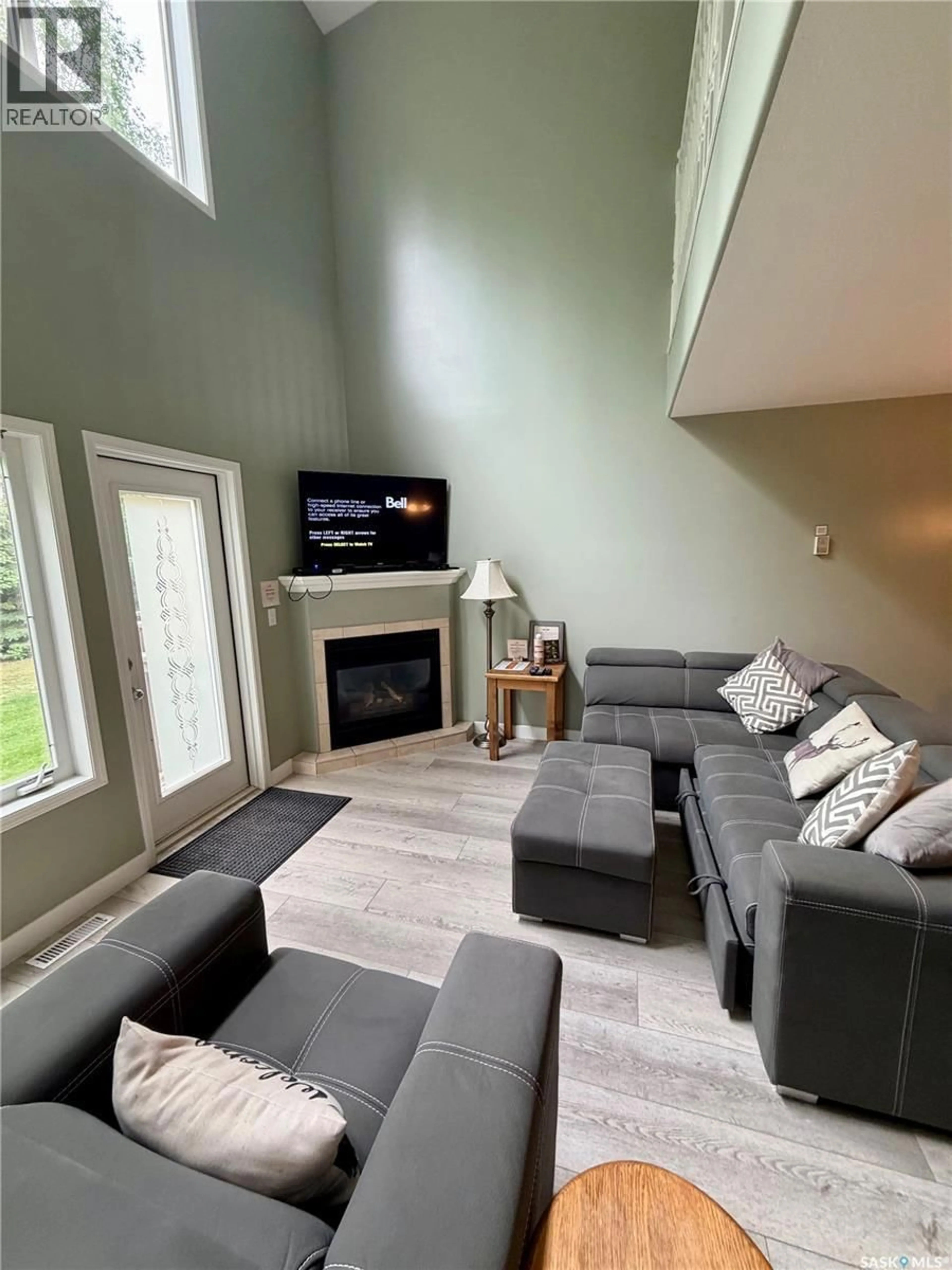 Living room with furniture, unknown for 17 FAIRWAY DRIVE, Elk Ridge Saskatchewan S0J0N0