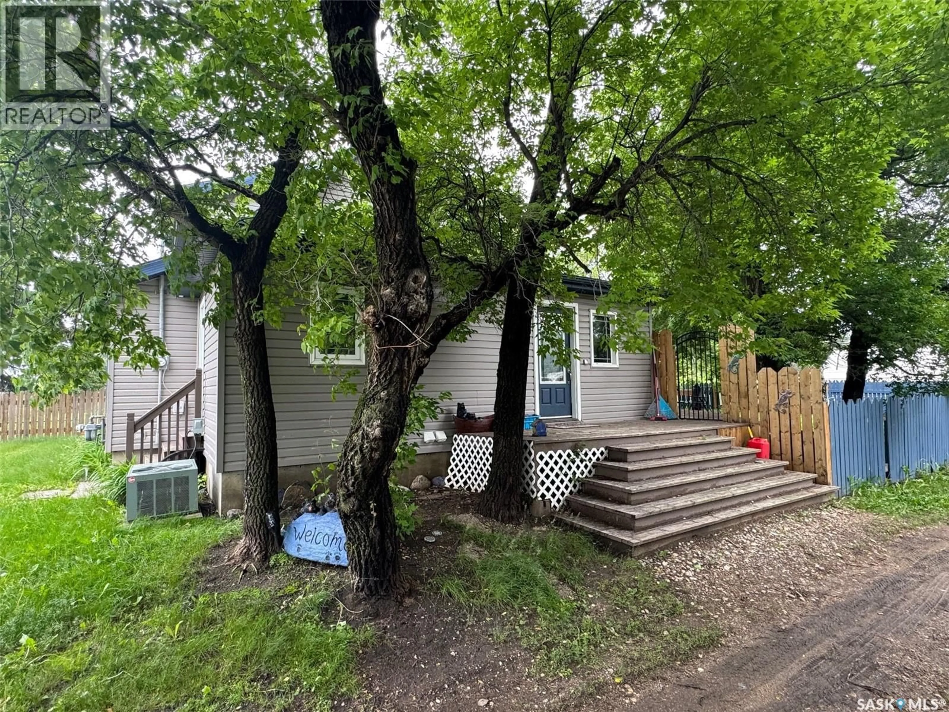 A pic from outside/outdoor area/front of a property/back of a property/a pic from drone, street for 305 2ND STREET, Spalding Saskatchewan S0K4C0