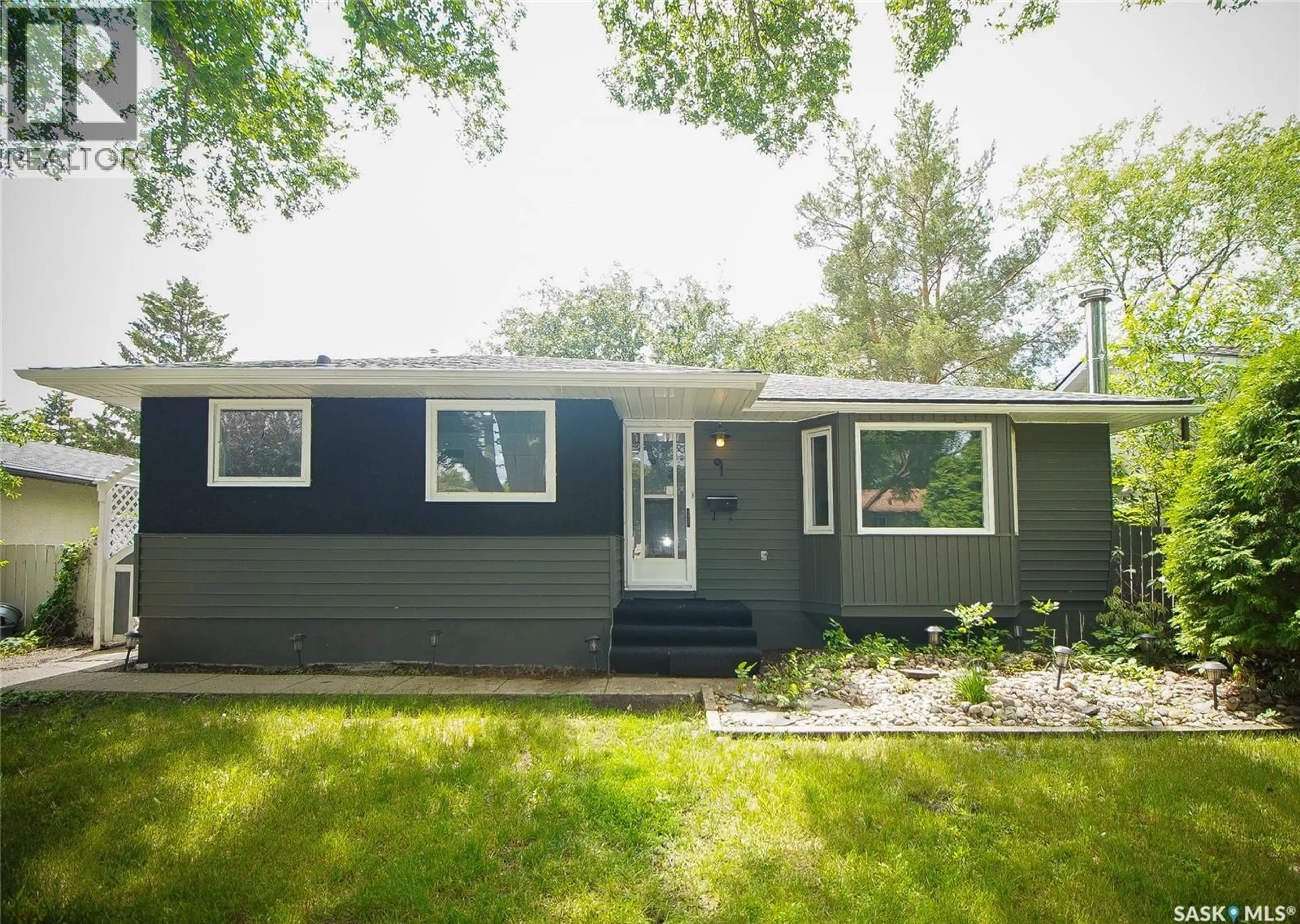 Home with vinyl exterior material, street for 61 BANNISTER AVENUE, Regina Saskatchewan S4R5K8