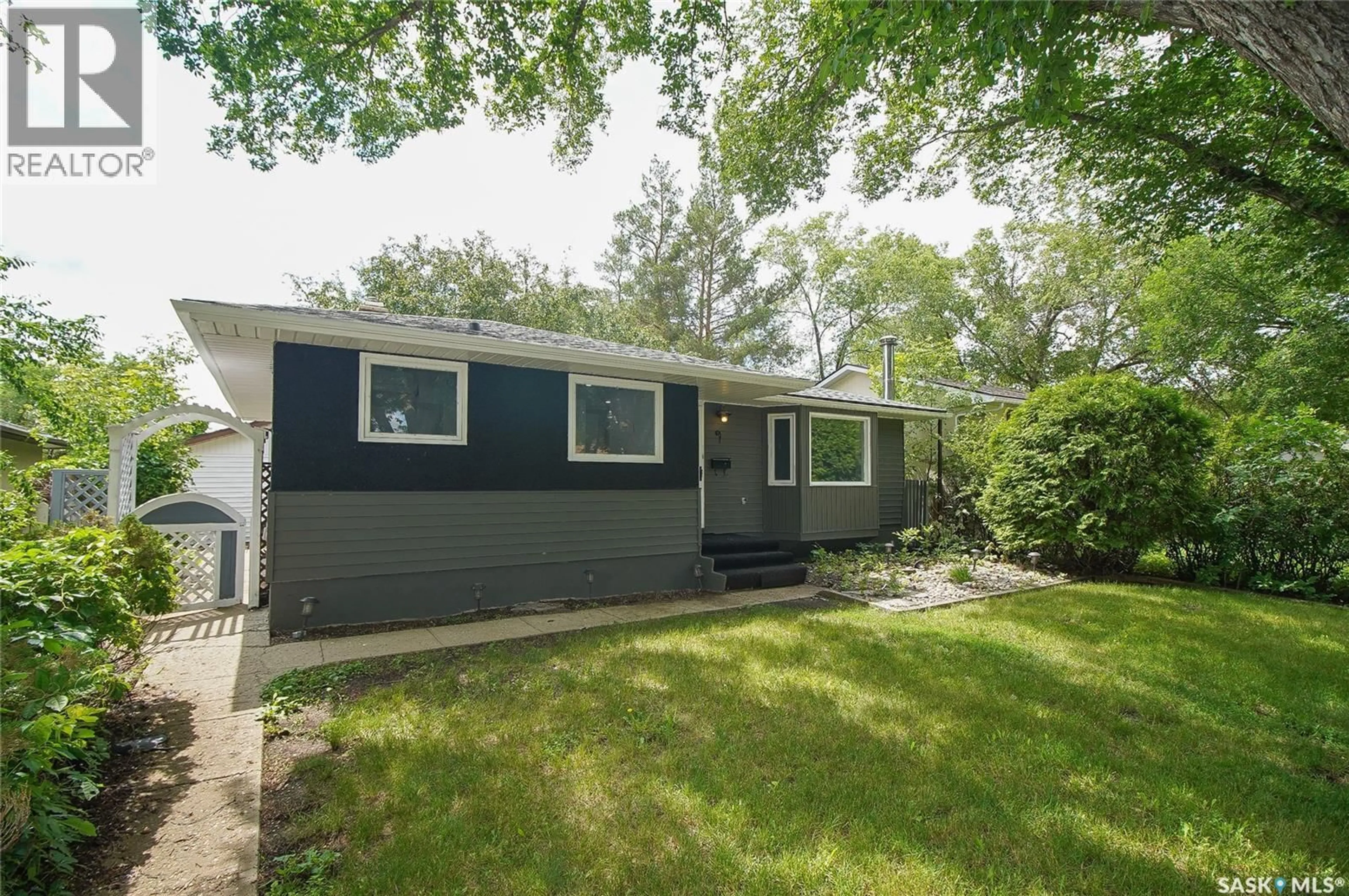 Home with vinyl exterior material, street for 61 BANNISTER AVENUE, Regina Saskatchewan S4R5K8