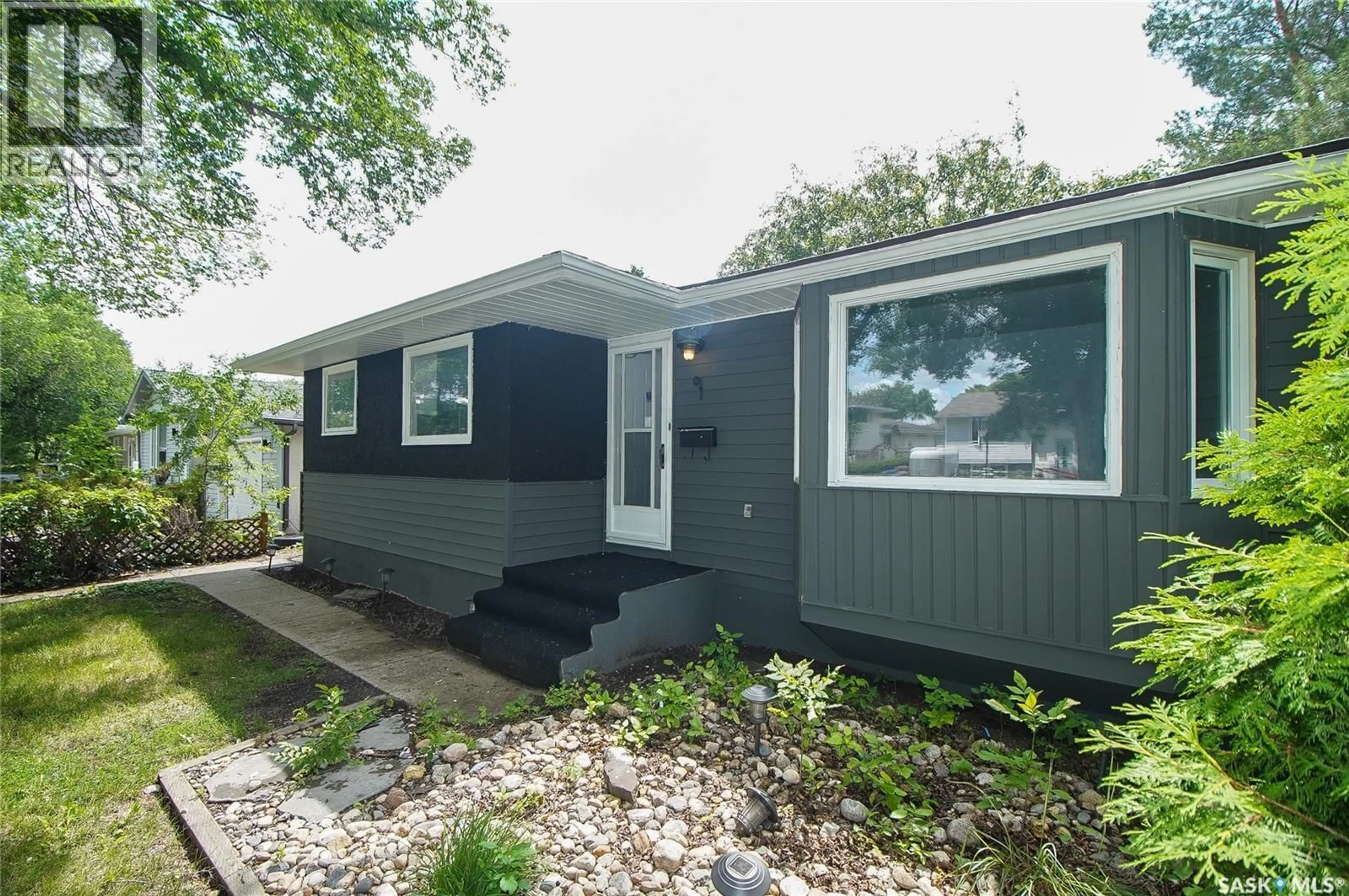 Home with vinyl exterior material, street for 61 BANNISTER AVENUE, Regina Saskatchewan S4R5K8