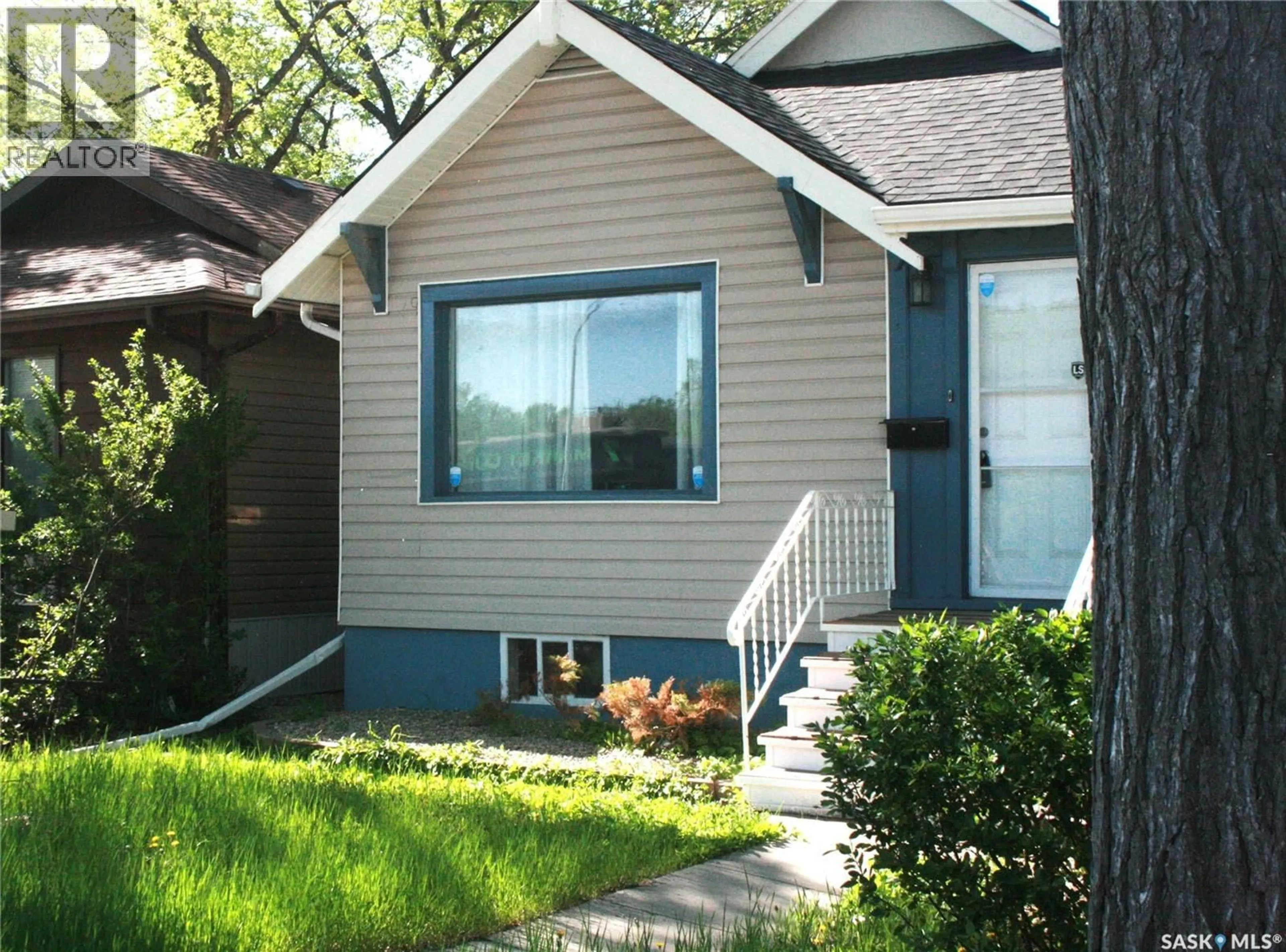 Home with vinyl exterior material, street for 3007 DEWDNEY AVENUE, Regina Saskatchewan S4T0Y3