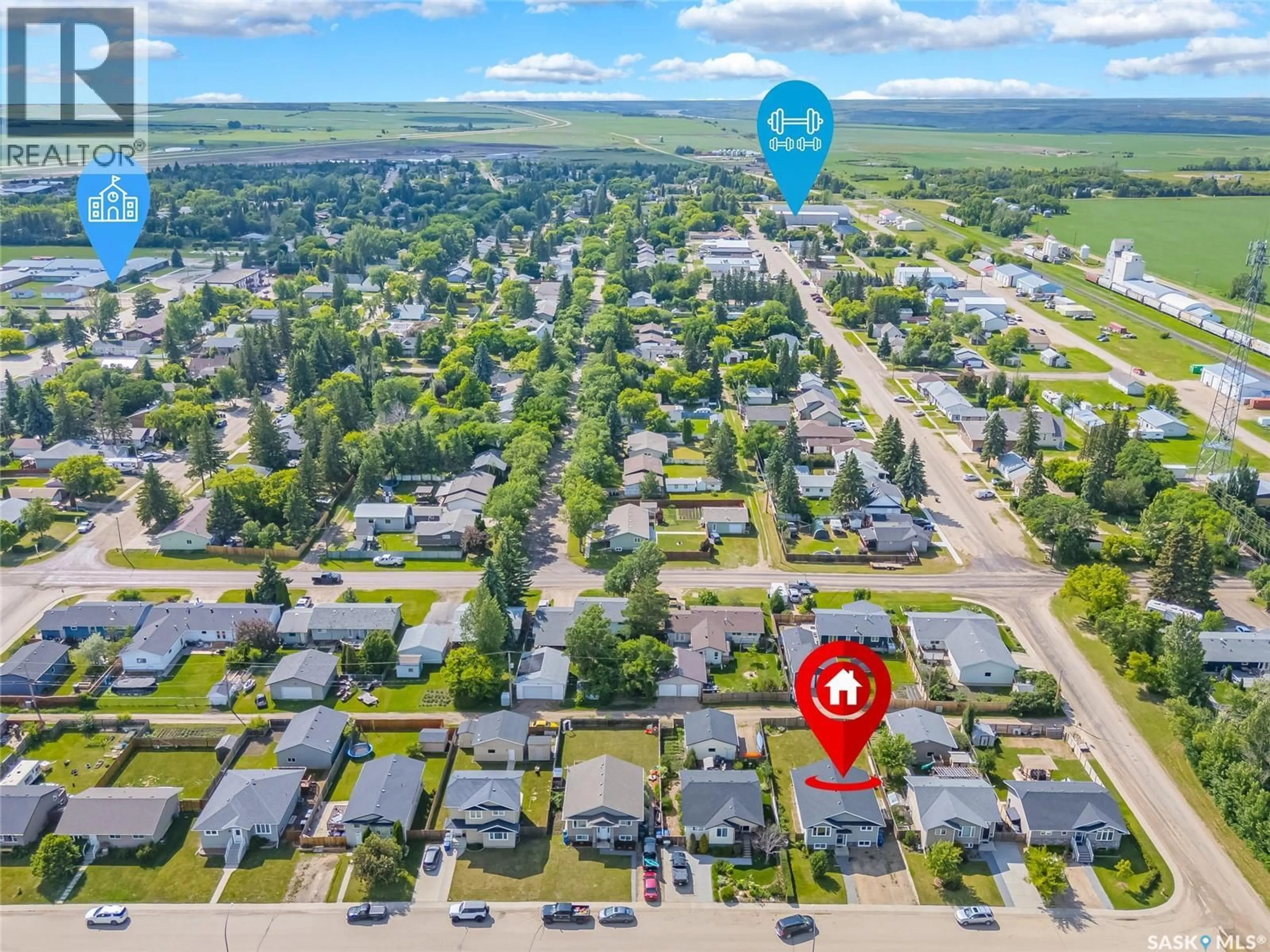 A pic from outside/outdoor area/front of a property/back of a property/a pic from drone, street for 16 6TH AVENUE, Langham Saskatchewan S0K2L0