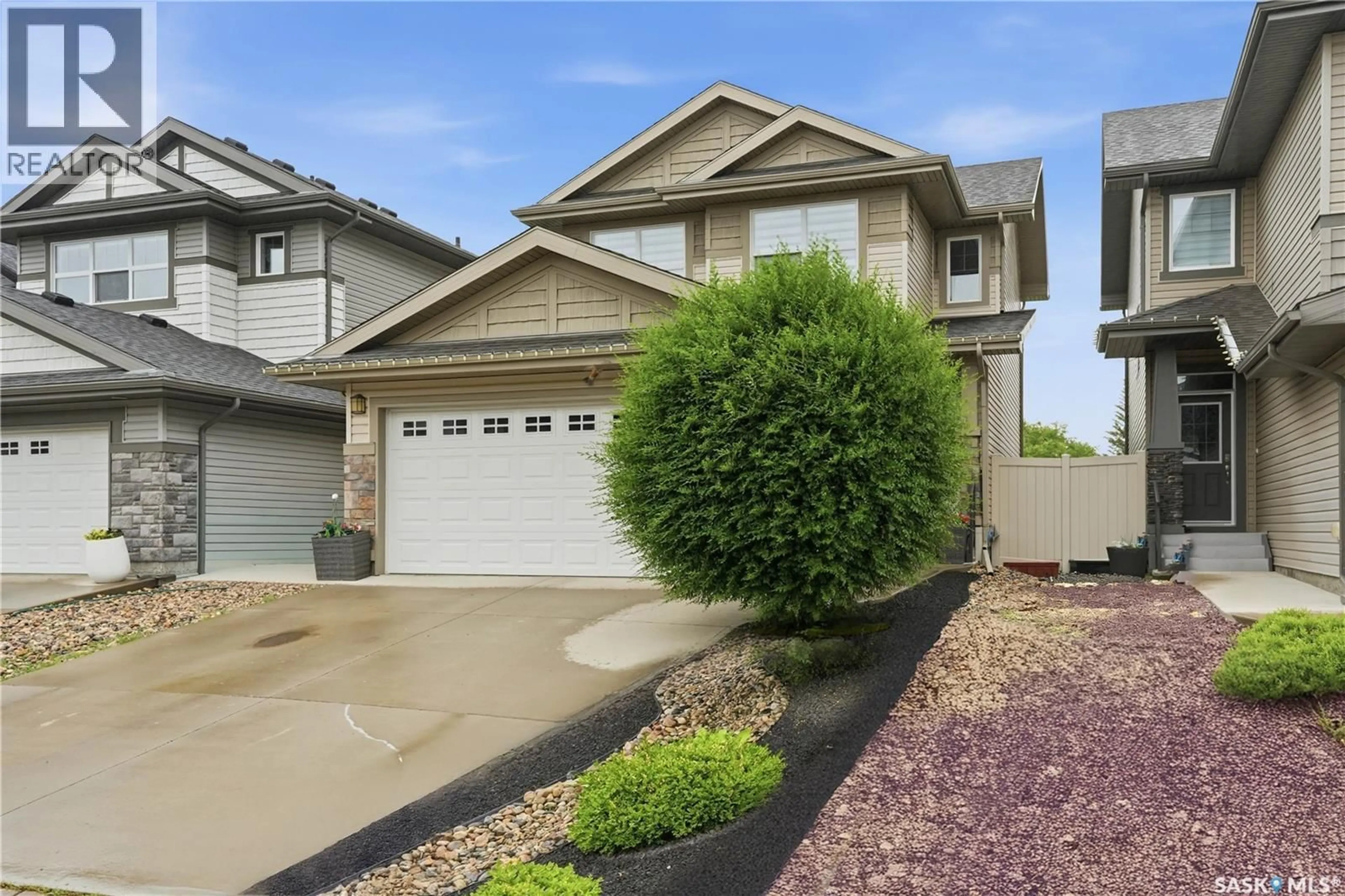 Home with vinyl exterior material, street for 3118 BROCK BAY, Regina Saskatchewan S4X0K4