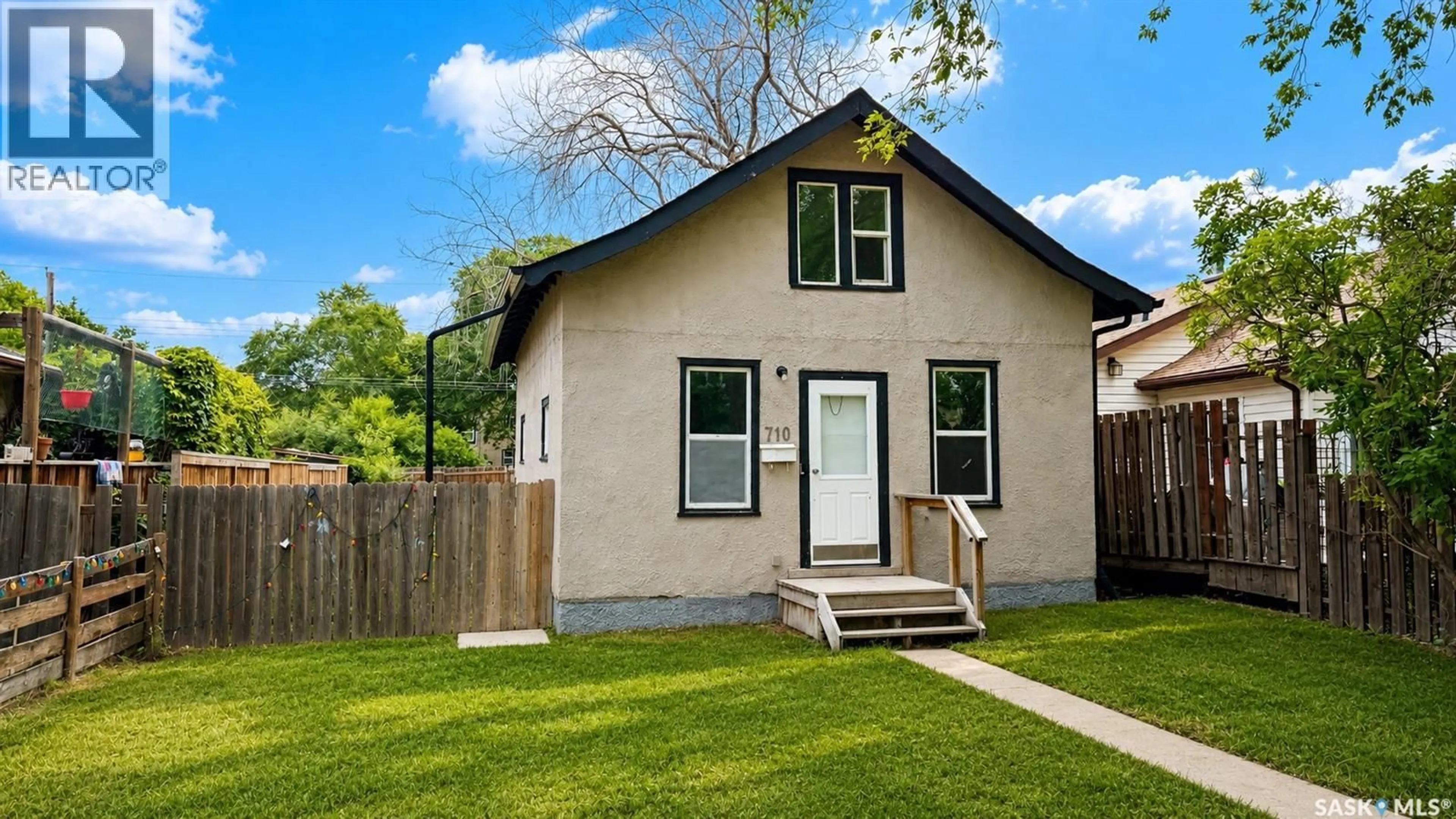 Home with vinyl exterior material, street for 710 M AVENUE, Saskatoon Saskatchewan S7M2L3