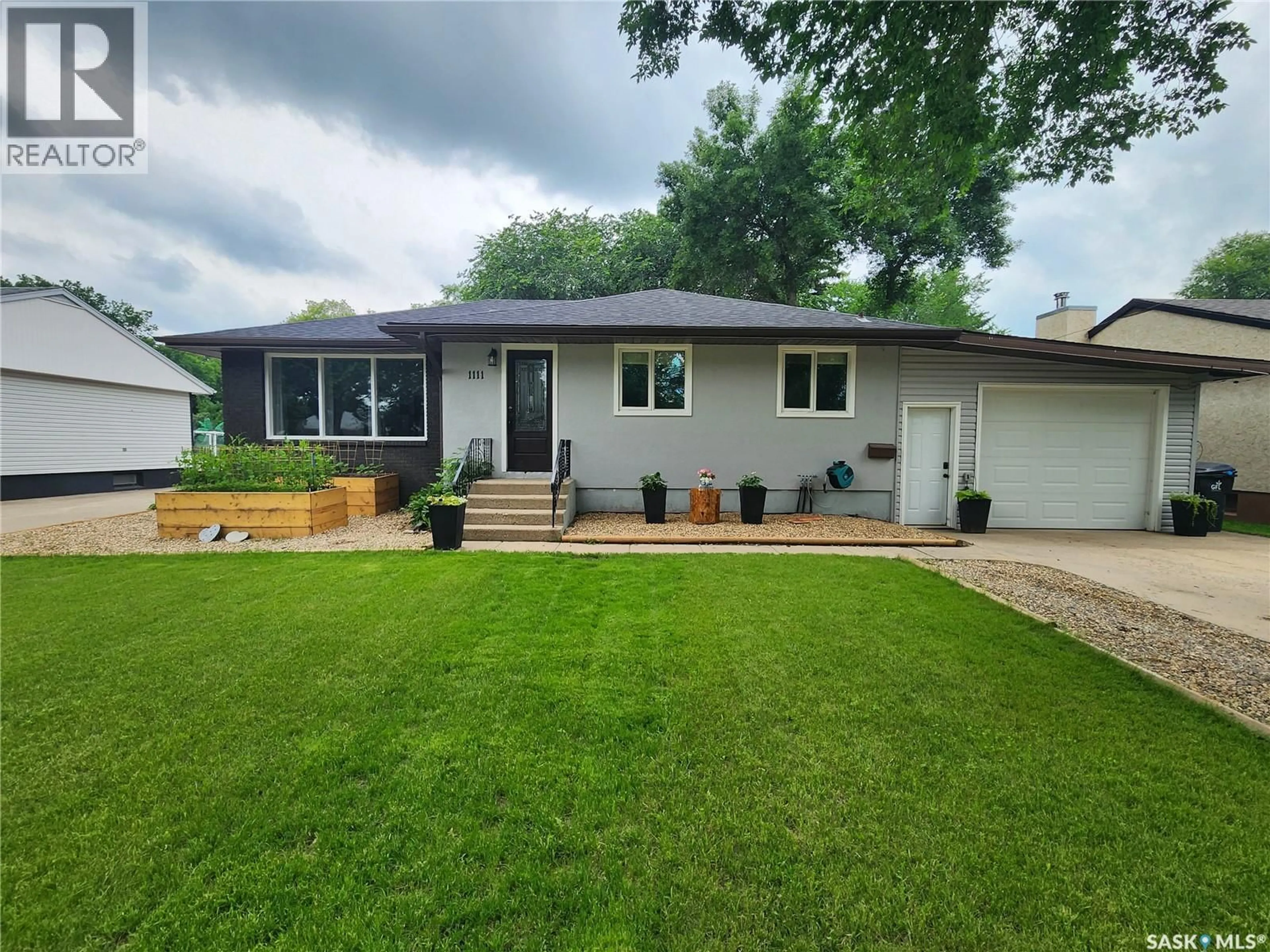 Home with vinyl exterior material, street for 1111 HUDSON ROAD, Estevan Saskatchewan S4A1Z1