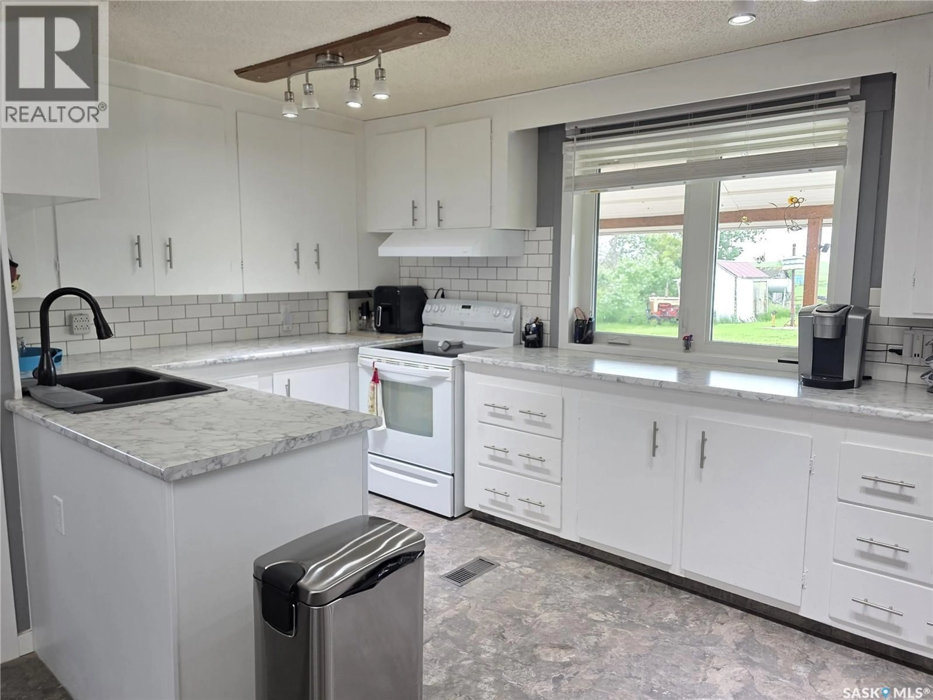 Open concept kitchen, ceramic/tile floor for SPENCE ACREAGE, Loreburn Rm No. 254 Saskatchewan S0H1Y0