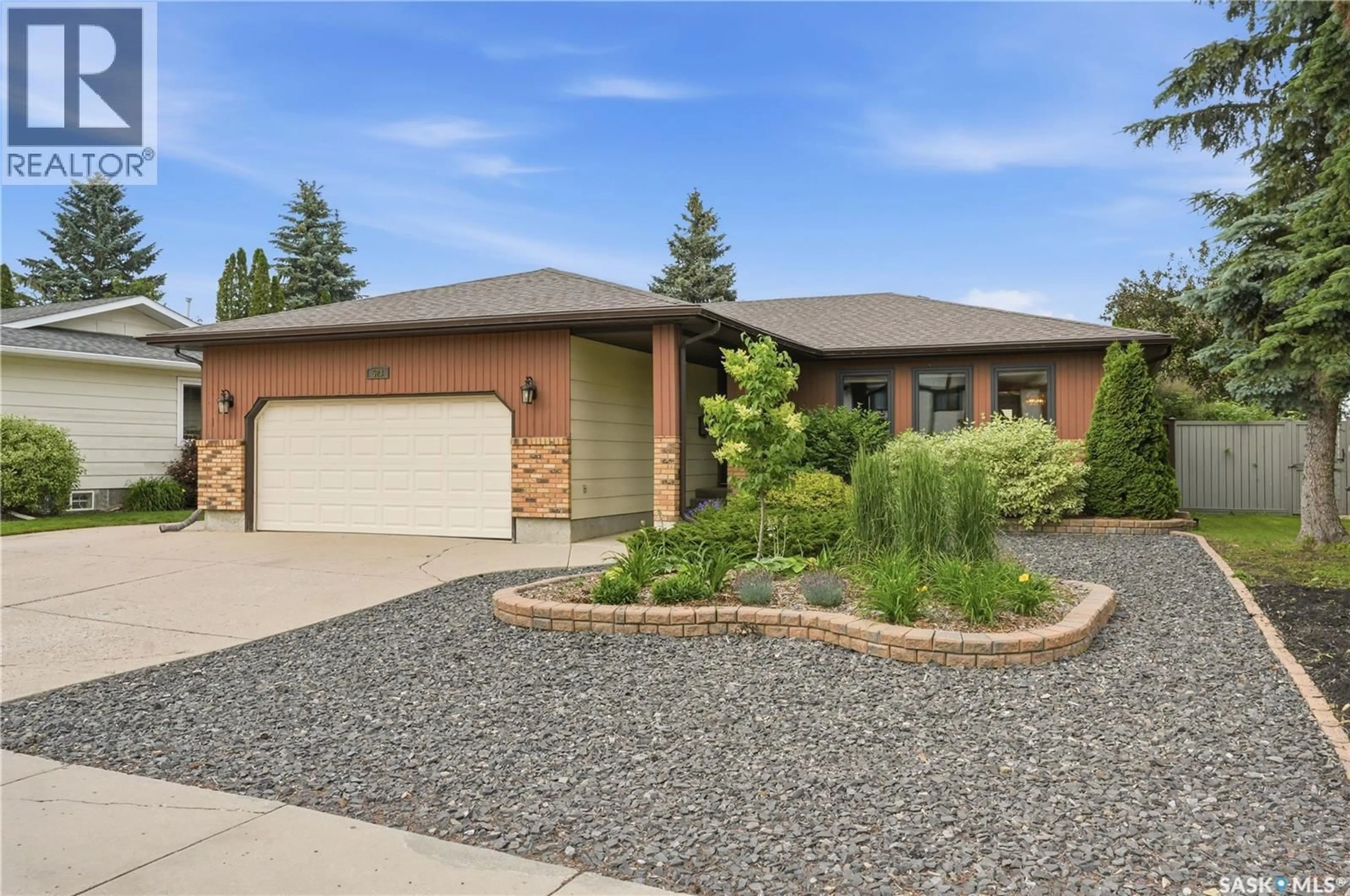 Home with brick exterior material, street for 523 SPENCER CRESCENT, Saskatoon Saskatchewan S7K7T5