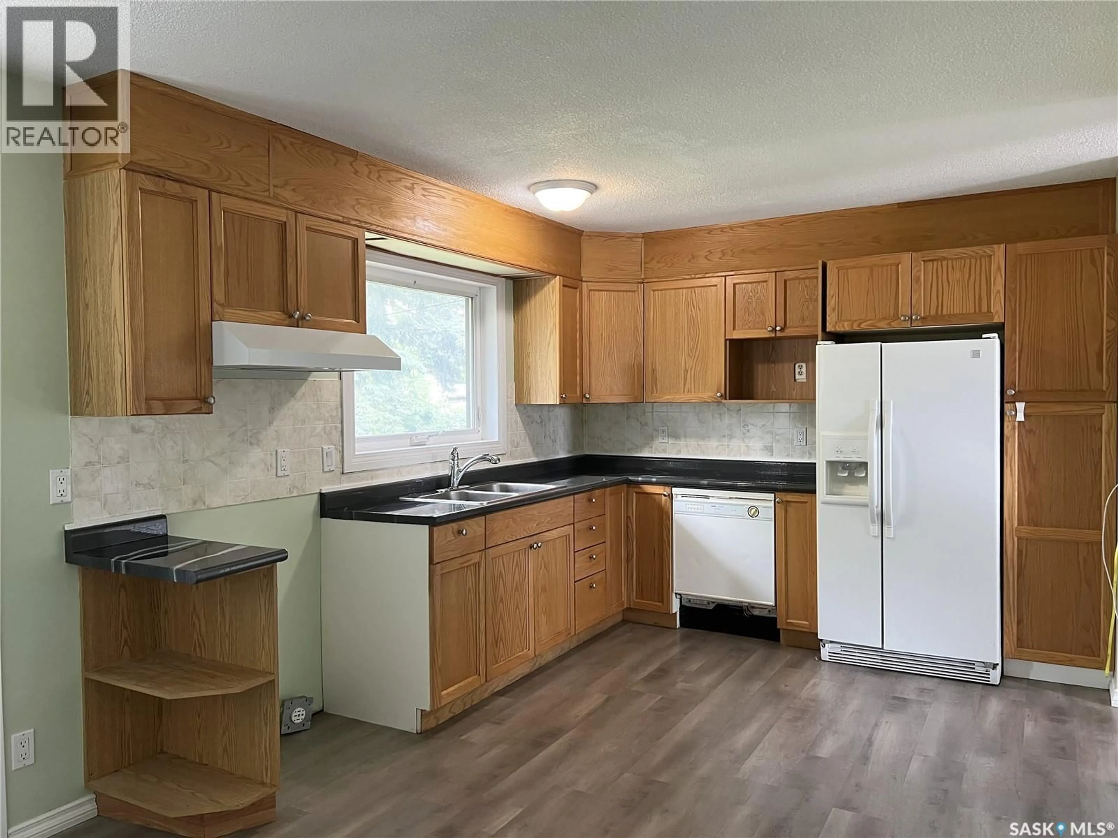 Standard kitchen, wood/laminate floor for 413 5TH STREET, Meadow Lake Saskatchewan S9X1A9