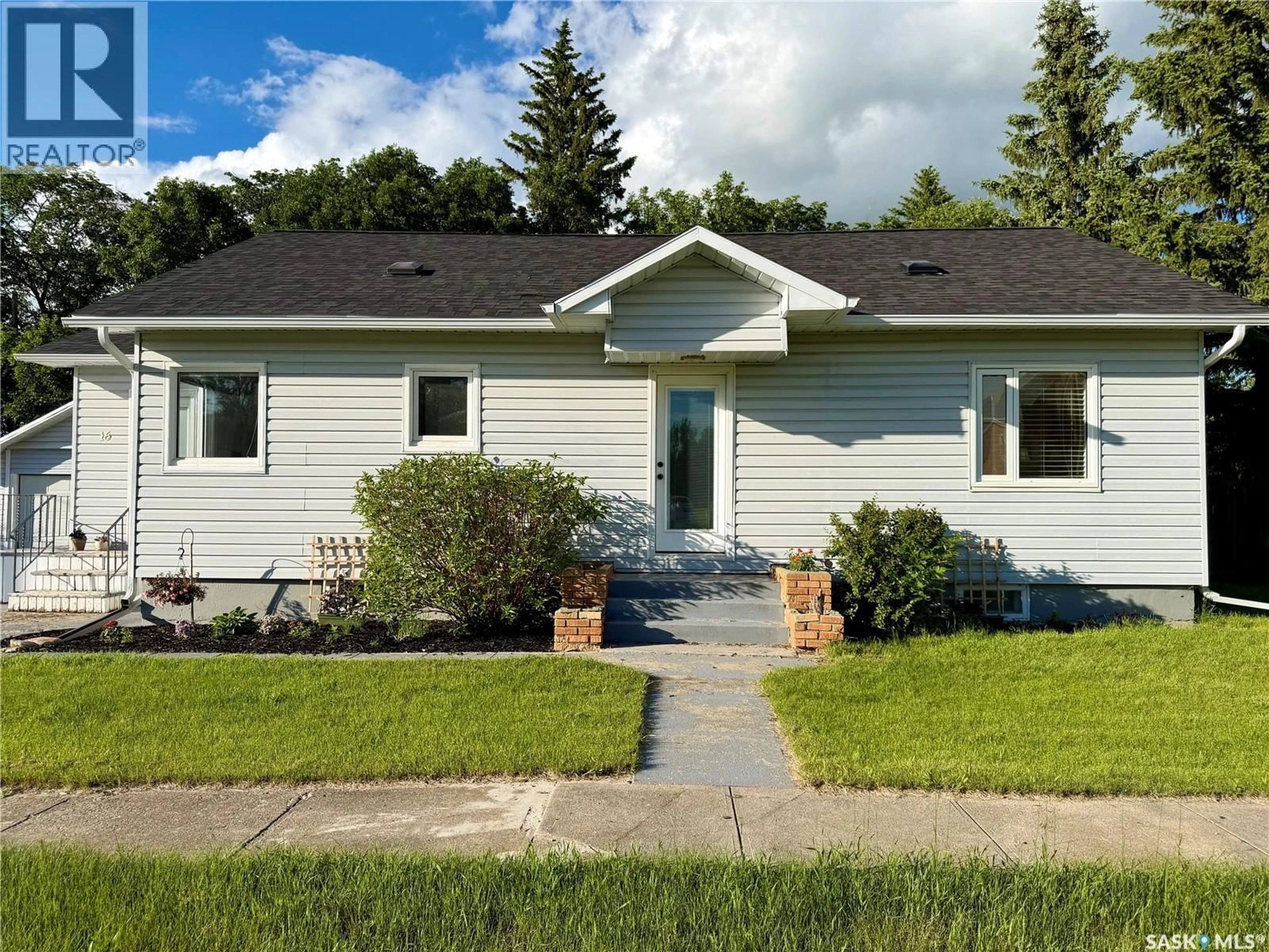 Home with vinyl exterior material, street for 16 WOODHAMS AVENUE, Fillmore Saskatchewan S0G1N0