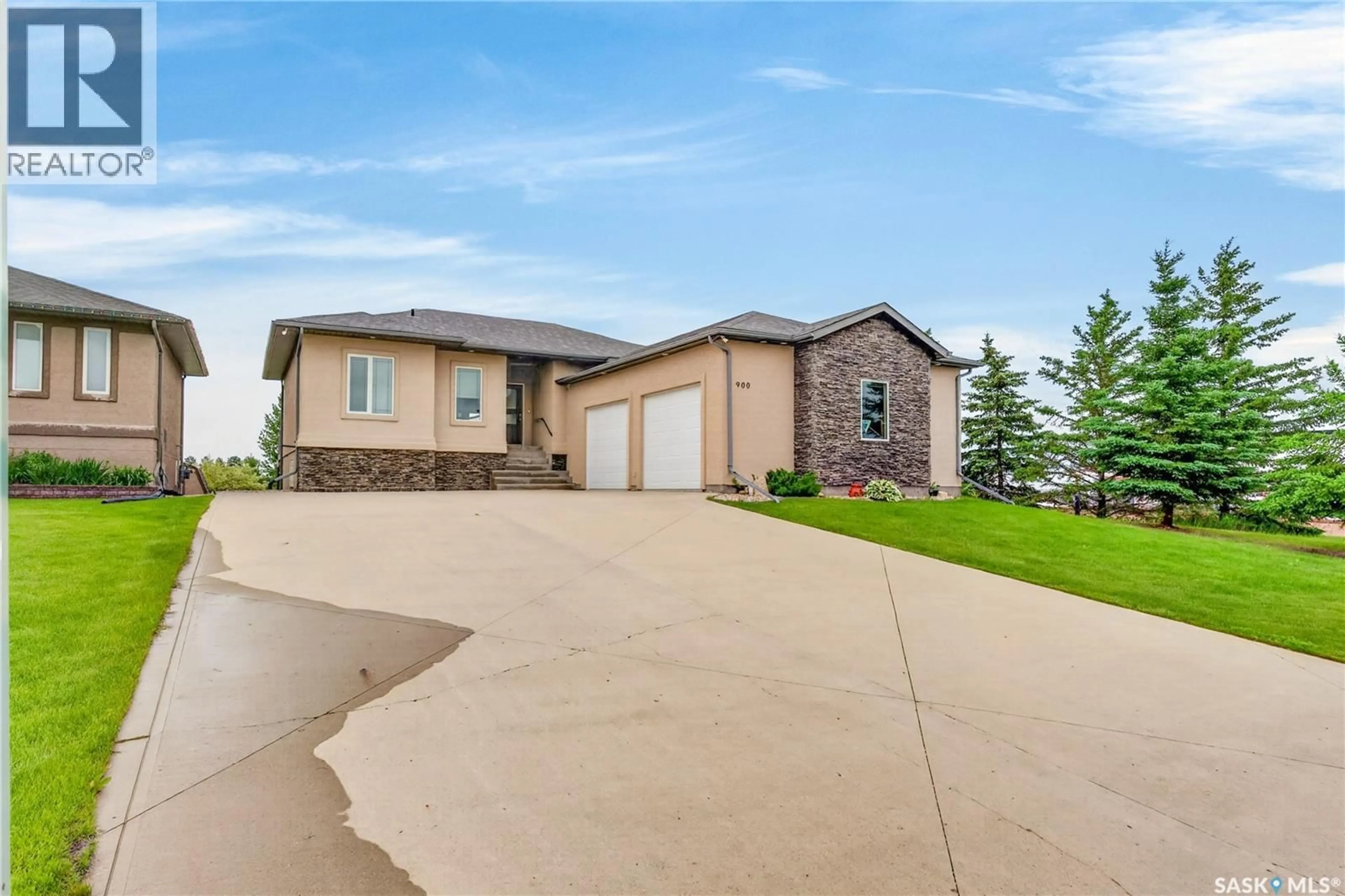 Home with brick exterior material, street for 900 WATER RIDGE CRESCENT, Humboldt Saskatchewan S0K2A0