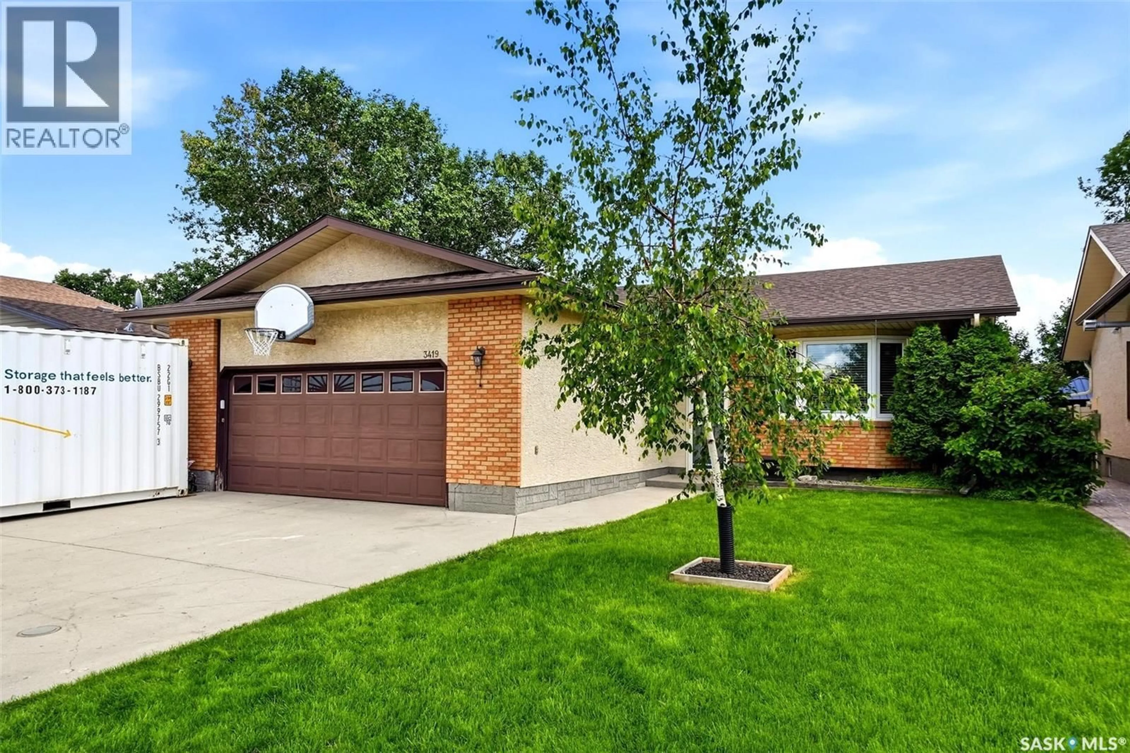 Home with brick exterior material, street for 3419 OLIVE GROVE, Regina Saskatchewan S4V2P2