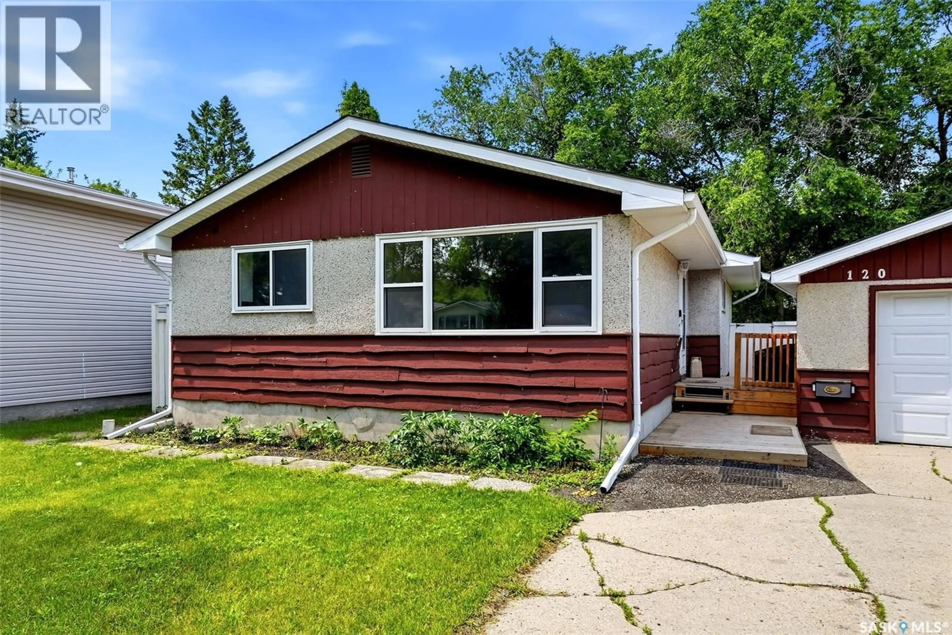 Home with vinyl exterior material, street for 120 SHANNON ROAD, Regina Saskatchewan S4S5B1
