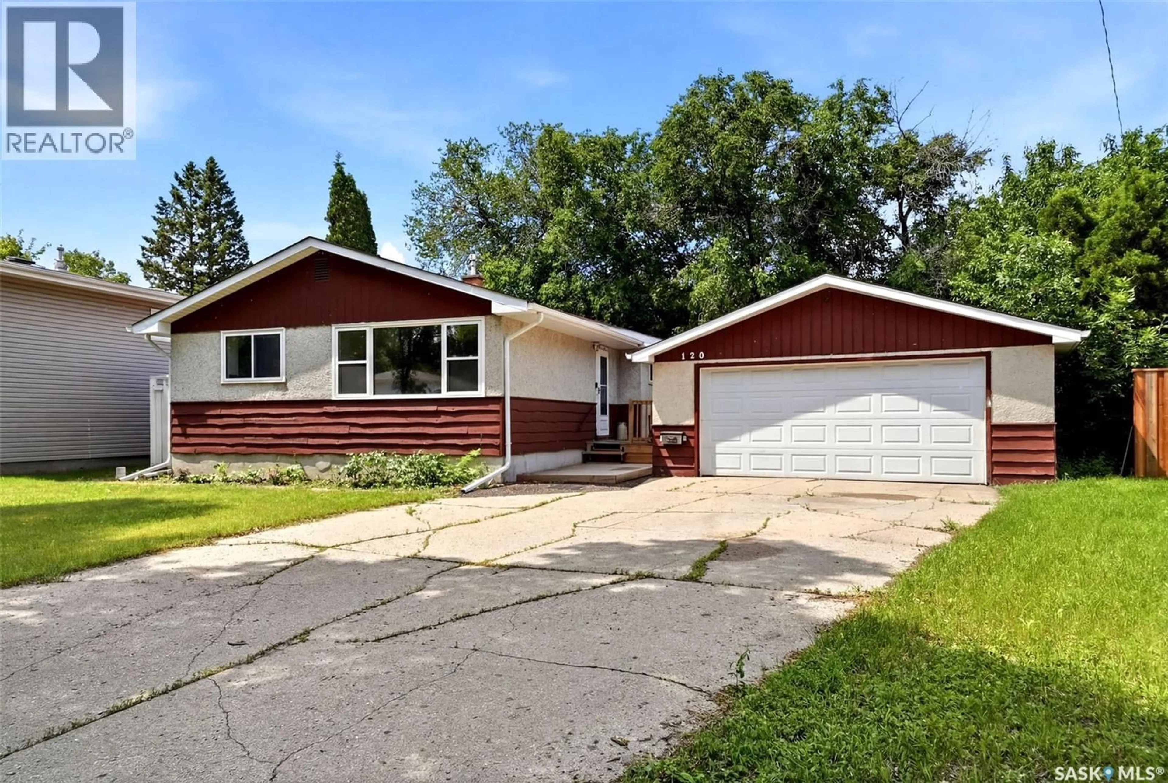 Home with vinyl exterior material, street for 120 SHANNON ROAD, Regina Saskatchewan S4S5B1