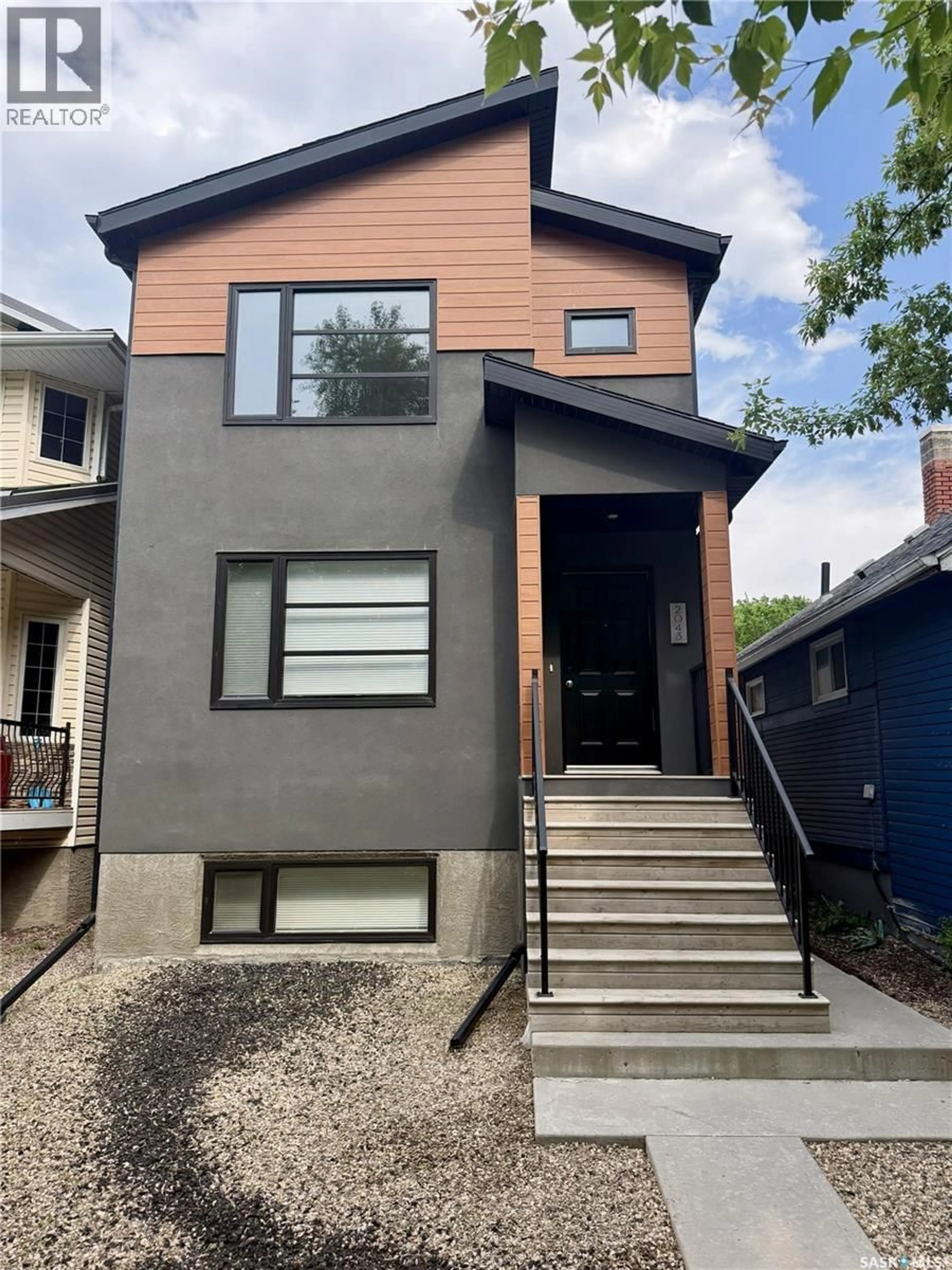Home with brick exterior material, street for 2043 BRODER STREET, Regina Saskatchewan S4N3S3