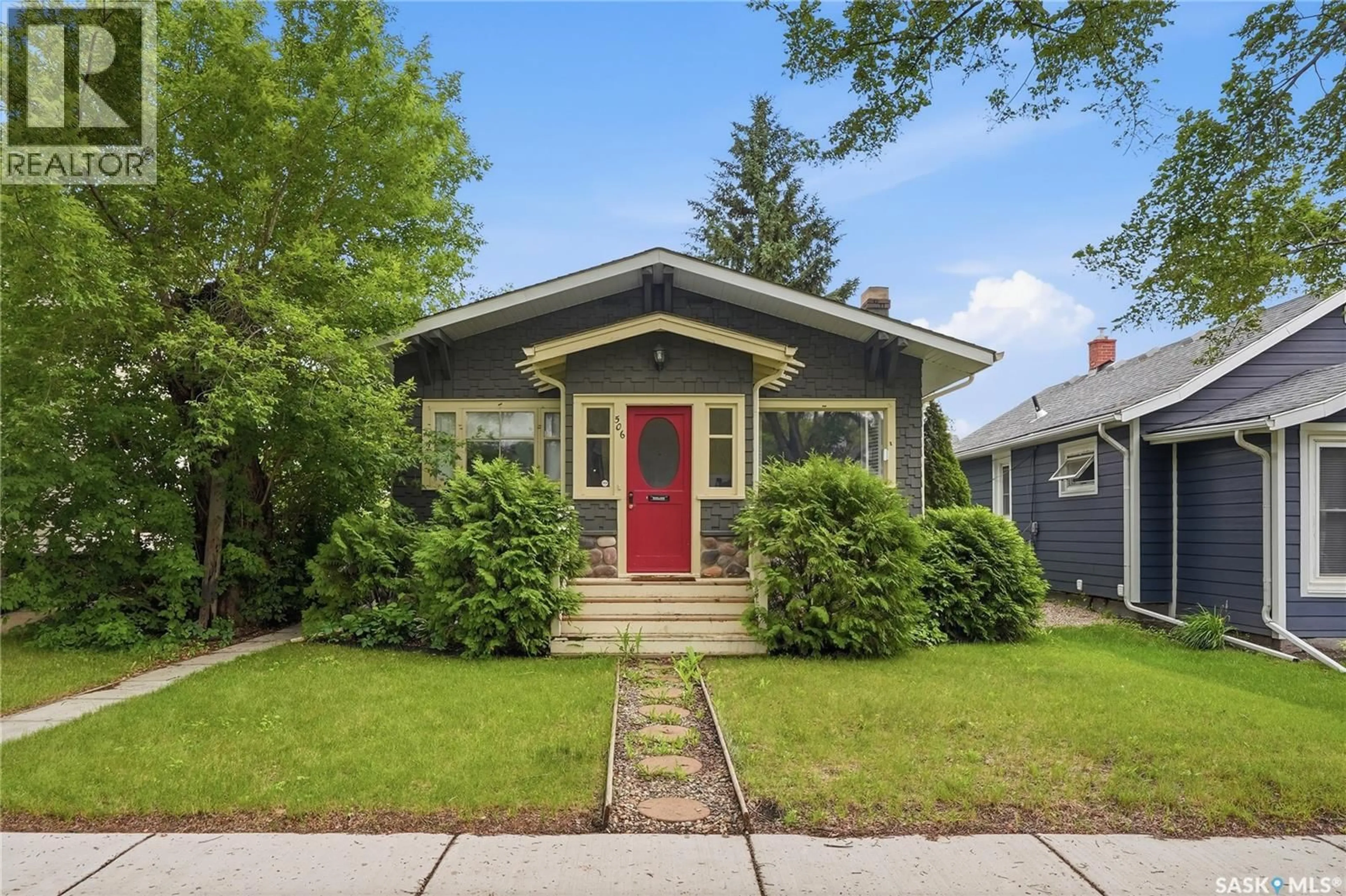 Home with vinyl exterior material, street for 506 5TH STREET, Saskatoon Saskatchewan S7H1G3