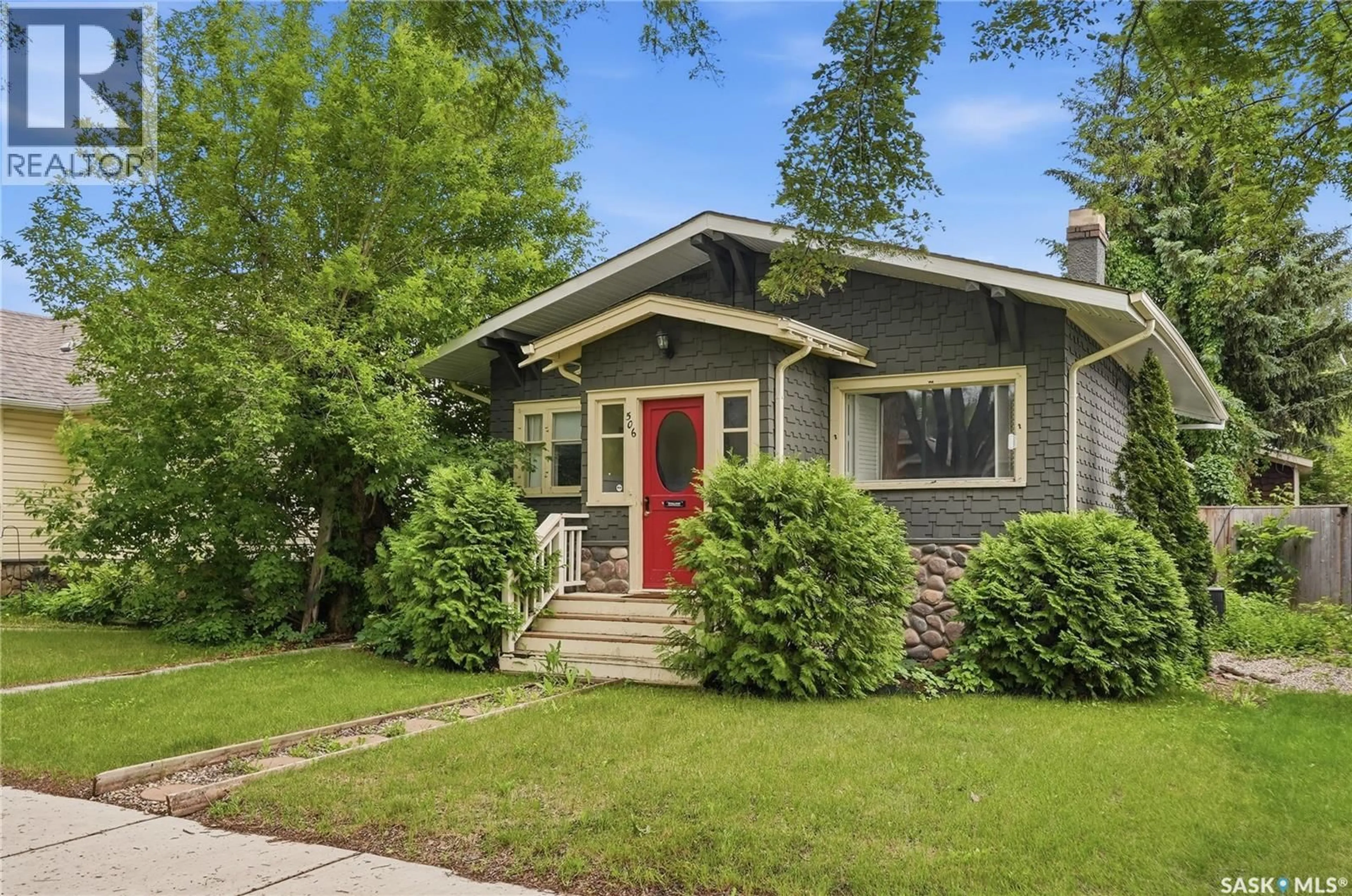 Home with vinyl exterior material, street for 506 5TH STREET, Saskatoon Saskatchewan S7H1G3