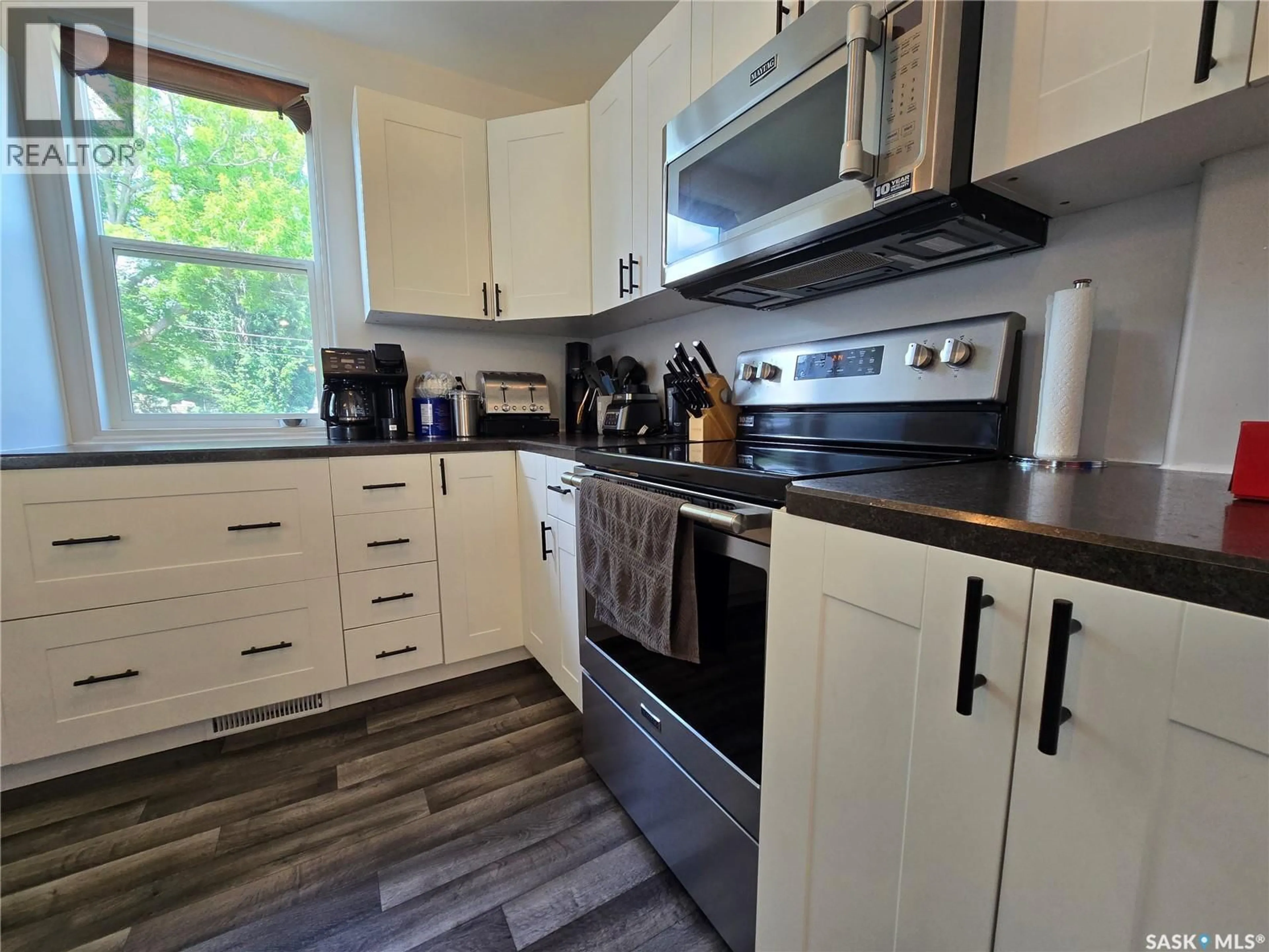 Standard kitchen, wood/laminate floor for 107 9TH AVENUE, Weyburn Saskatchewan S4H1Z6