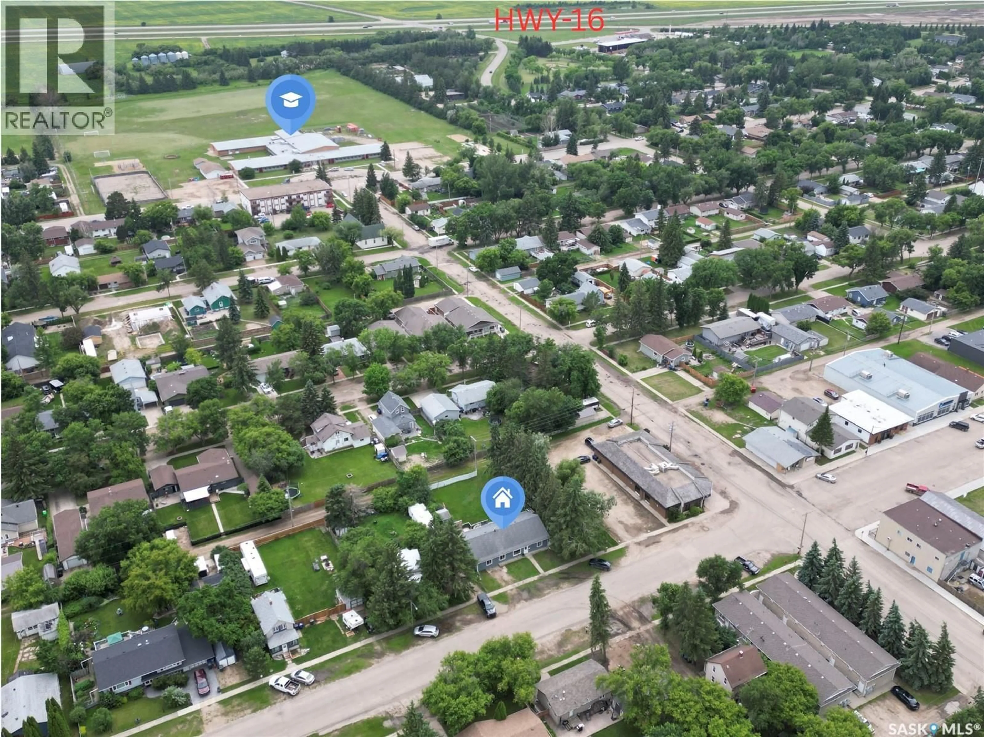 A pic from outside/outdoor area/front of a property/back of a property/a pic from drone, street for 314 MAIN STREET, Langham Saskatchewan S0K2L0
