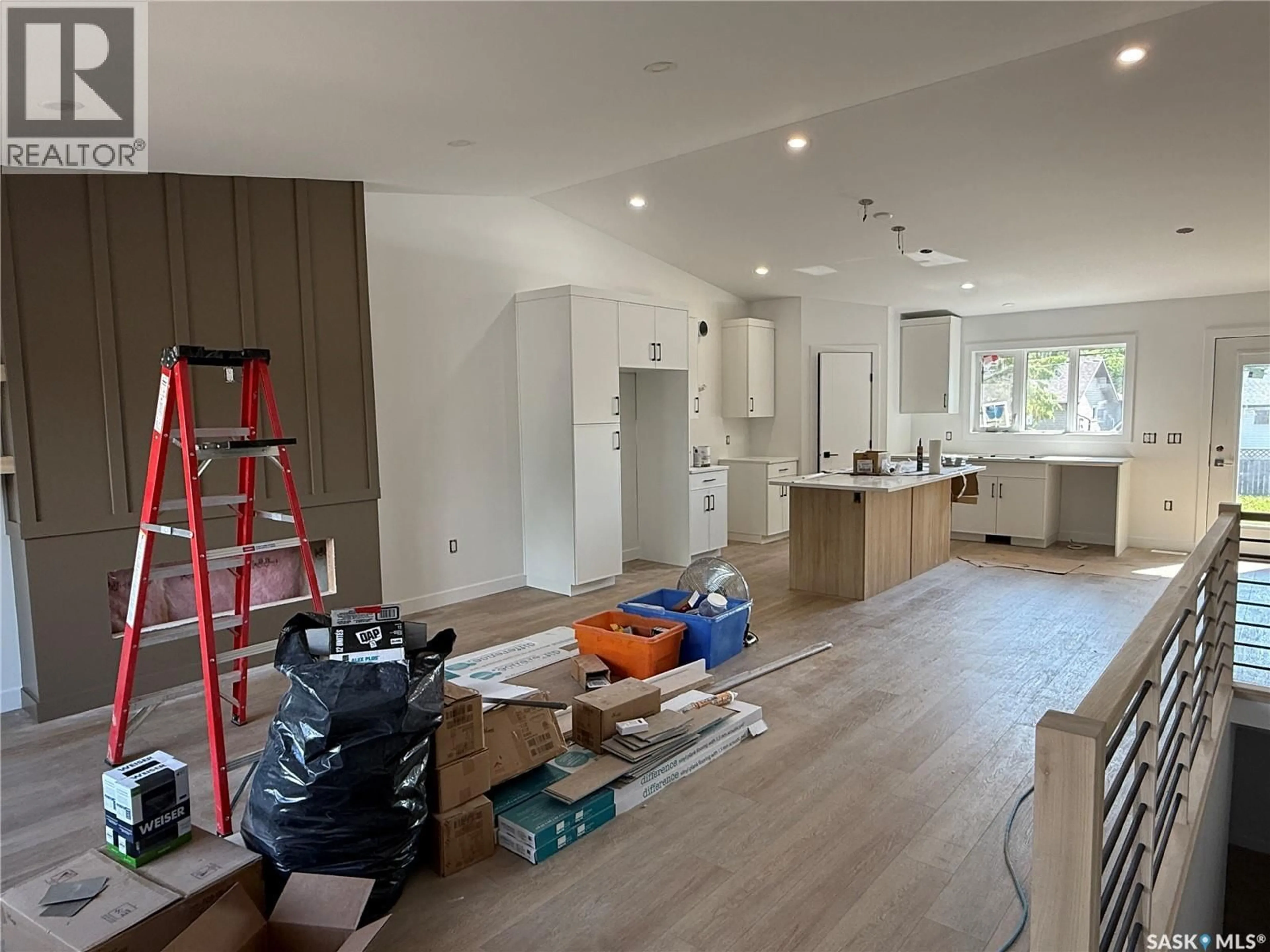 Open concept kitchen, wood/laminate floor for 620 14TH STREET, Humboldt Saskatchewan S0K2A0