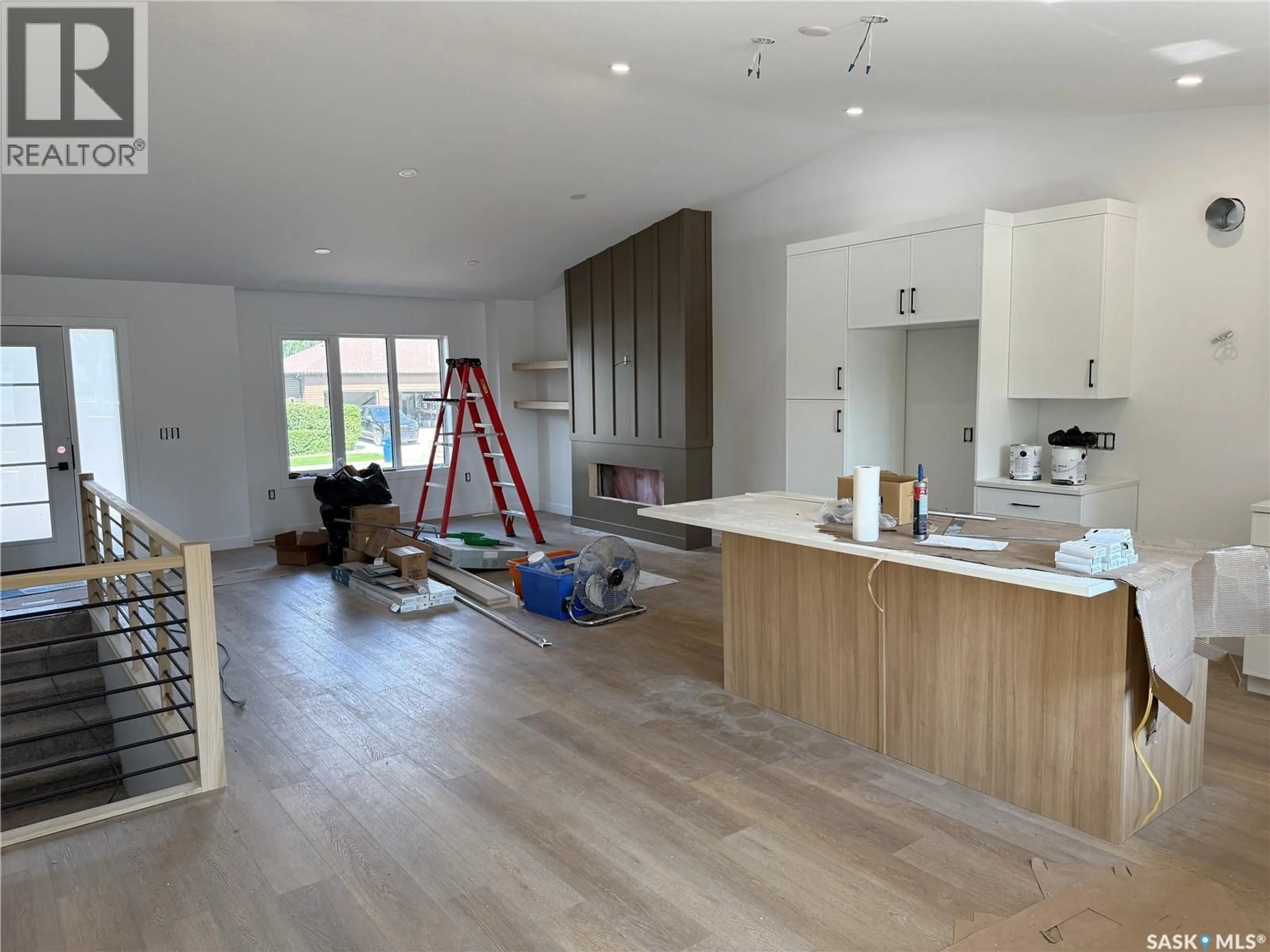 Open concept kitchen, wood/laminate floor for 620 14TH STREET, Humboldt Saskatchewan S0K2A0