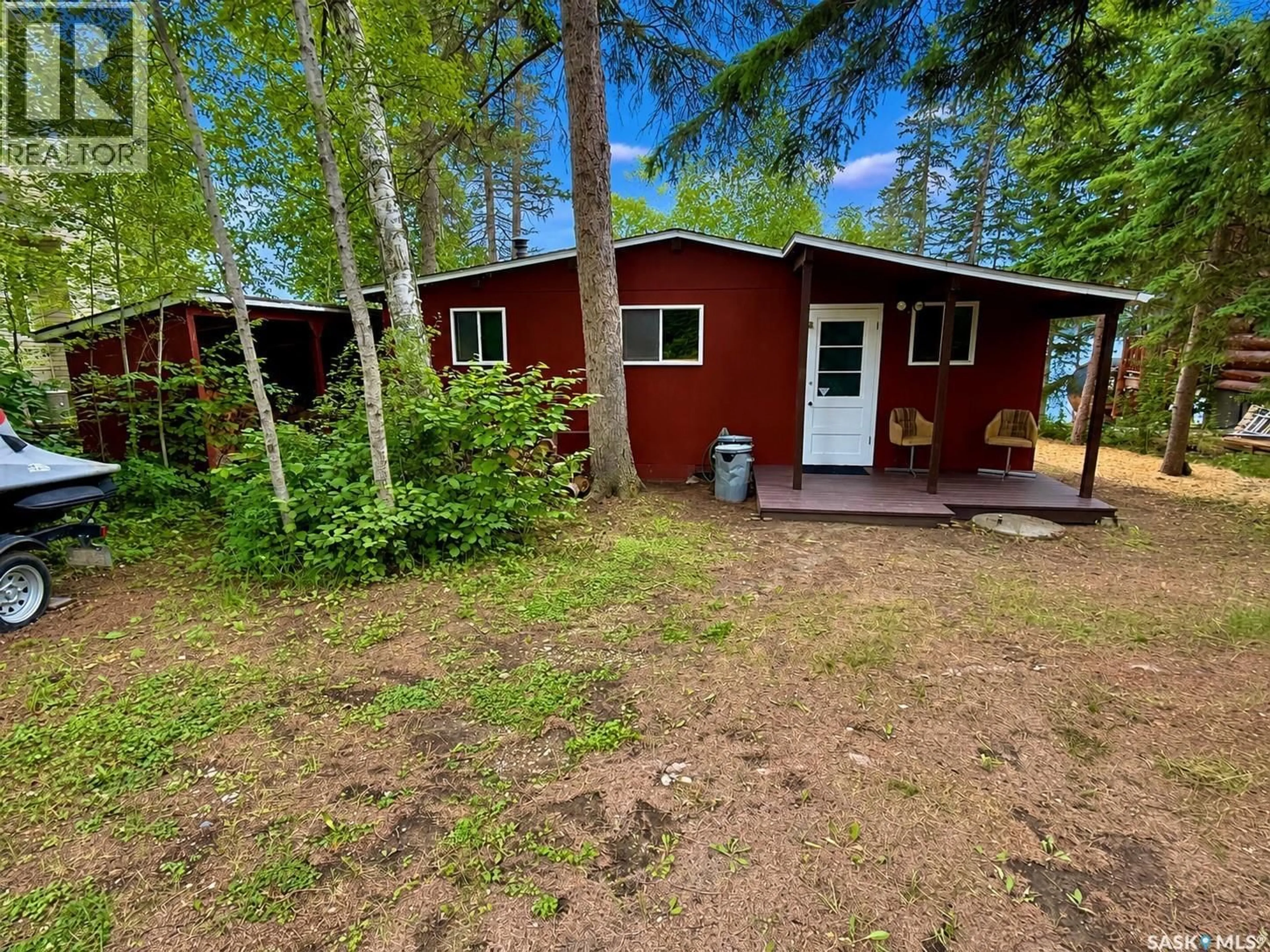 A pic from outside/outdoor area/front of a property/back of a property/a pic from drone, forest/trees view for 550 NEIS DRIVE, Emma Lake Saskatchewan S0J0N0