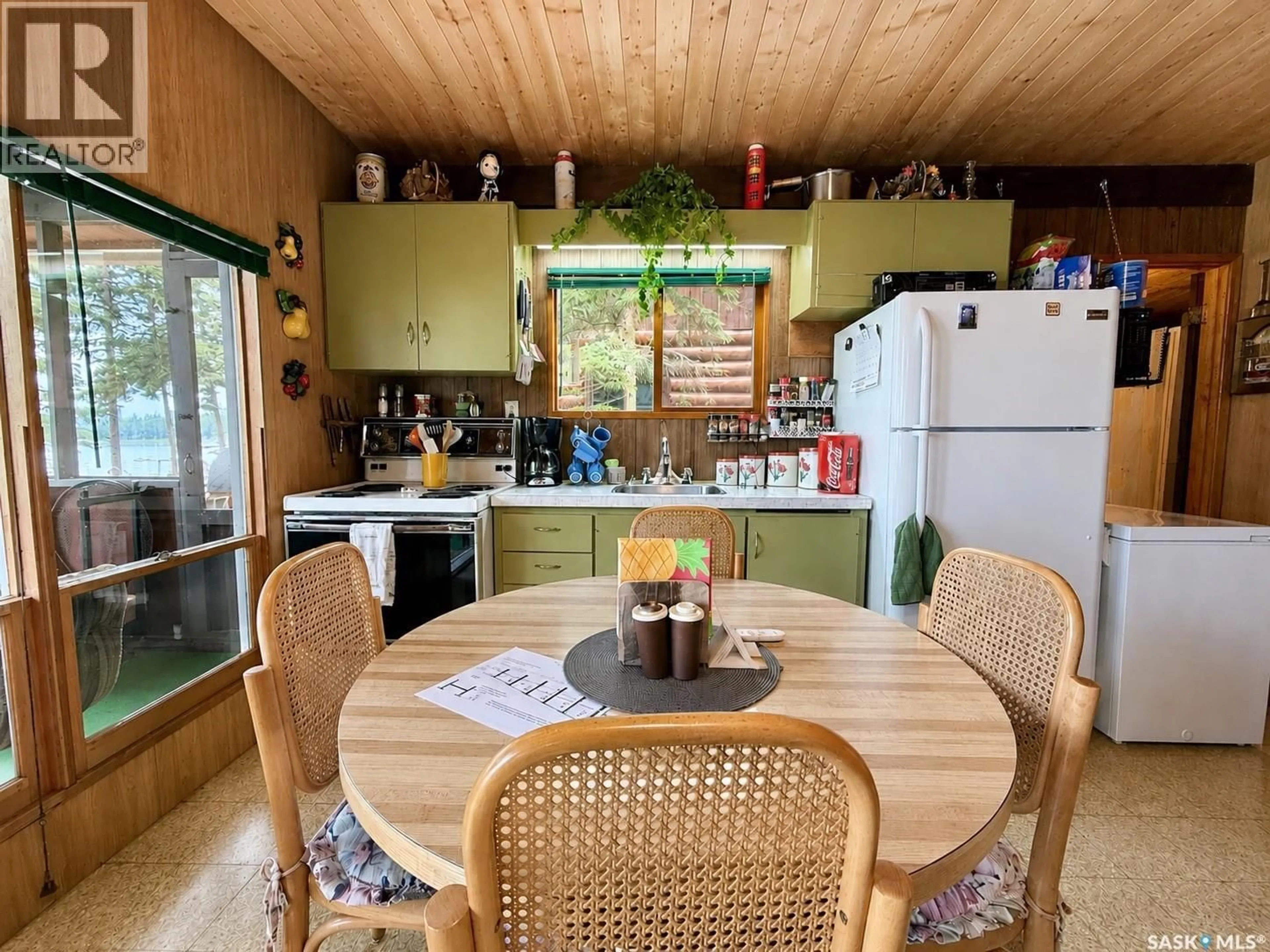 Standard kitchen, wood/laminate floor for 550 NEIS DRIVE, Emma Lake Saskatchewan S0J0N0