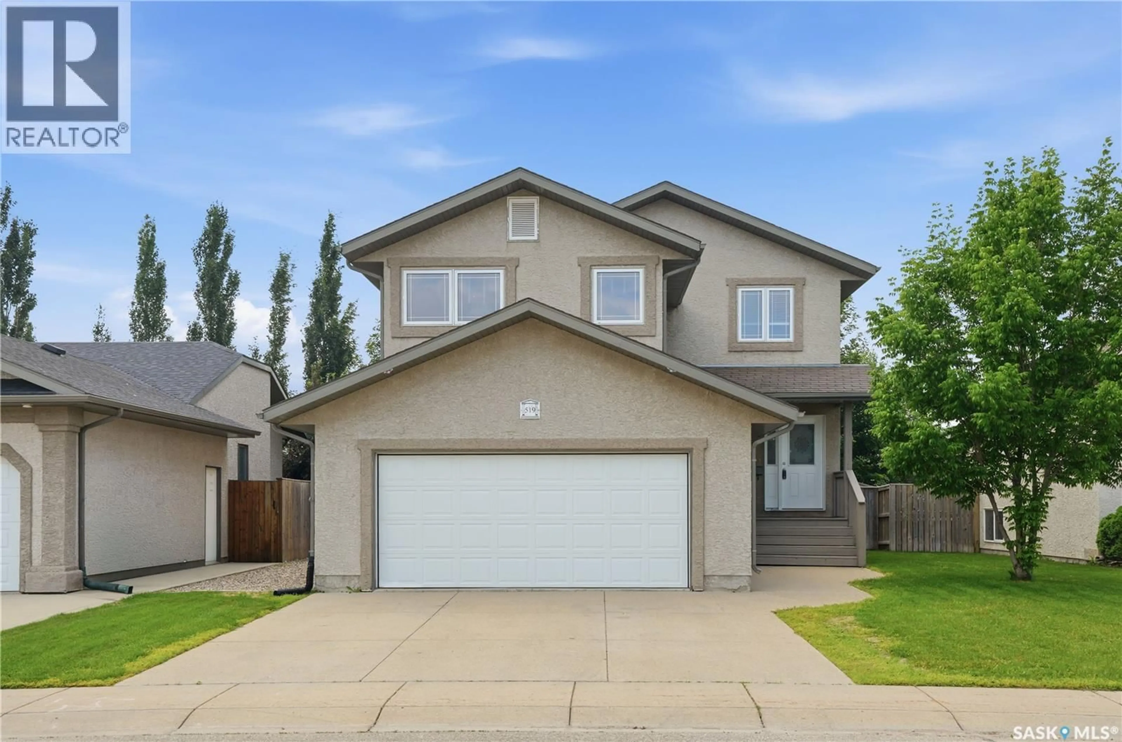 Home with vinyl exterior material, street for 519 ENS CRESCENT, Warman Saskatchewan S0K4S0