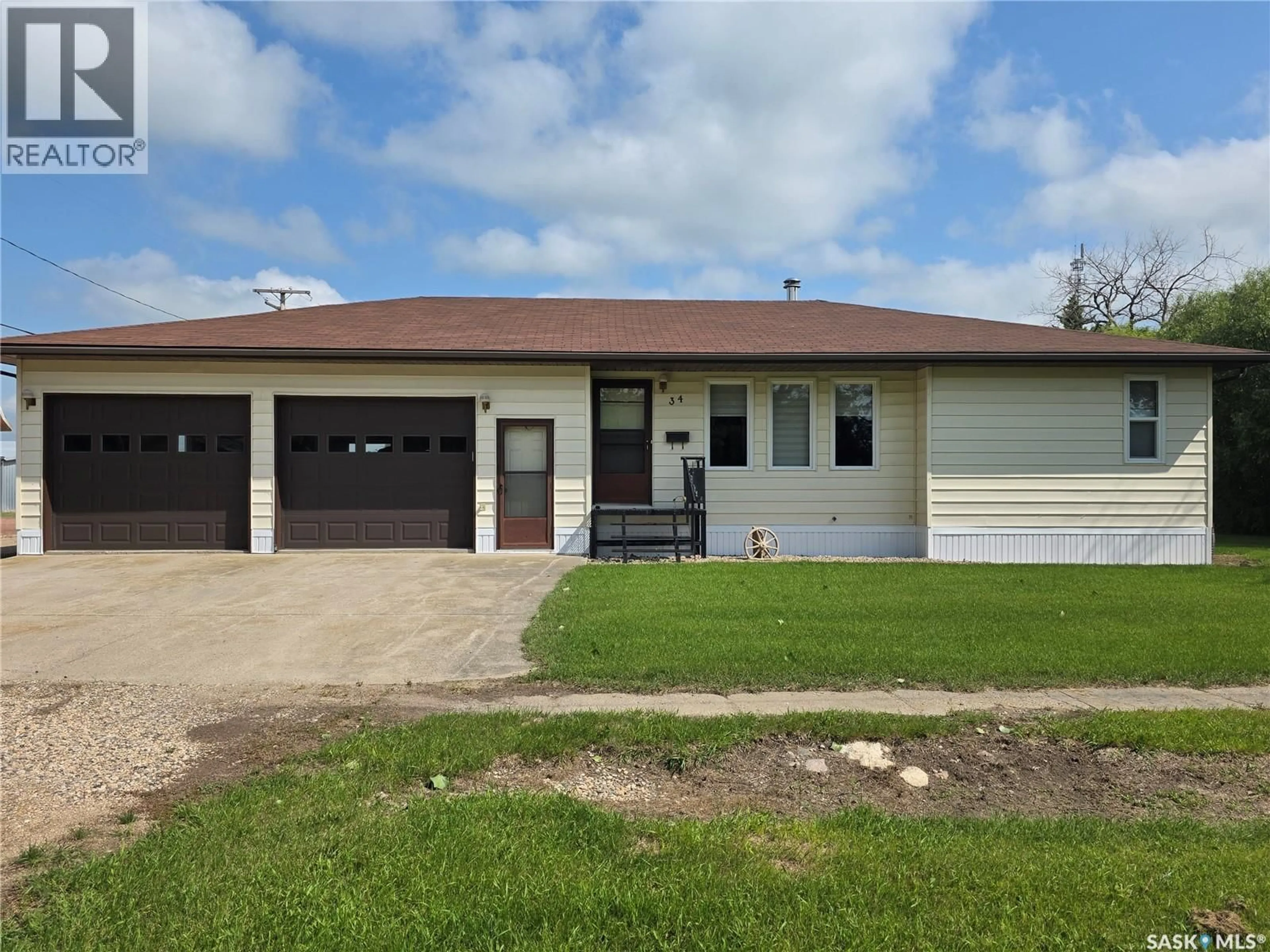 Home with vinyl exterior material, street for 34 STANLEY STREET, Creelman Saskatchewan S0G0X0