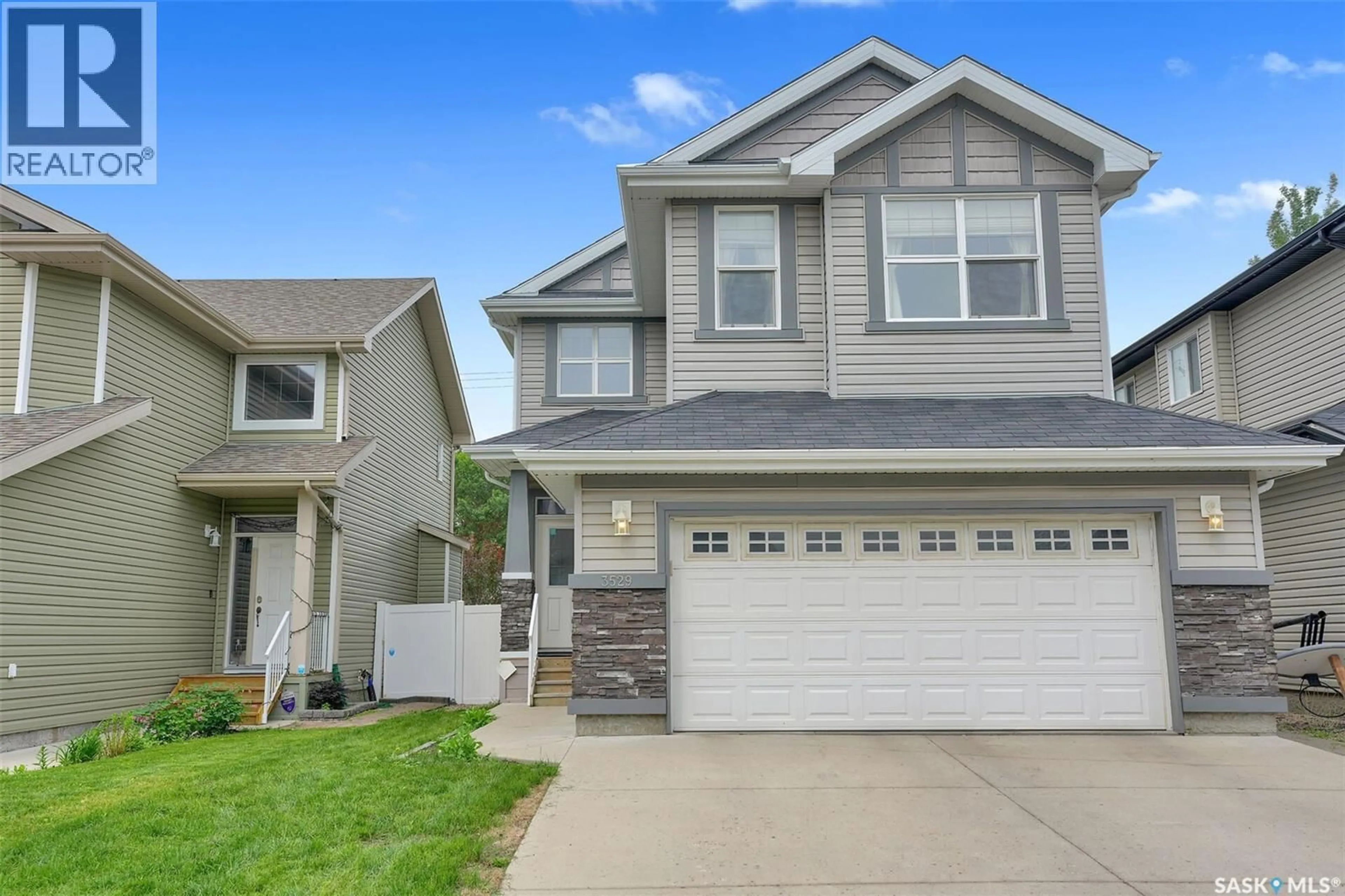 Home with vinyl exterior material, street for 3529 GREEN MOSS LANE, Regina Saskatchewan S4V1L5
